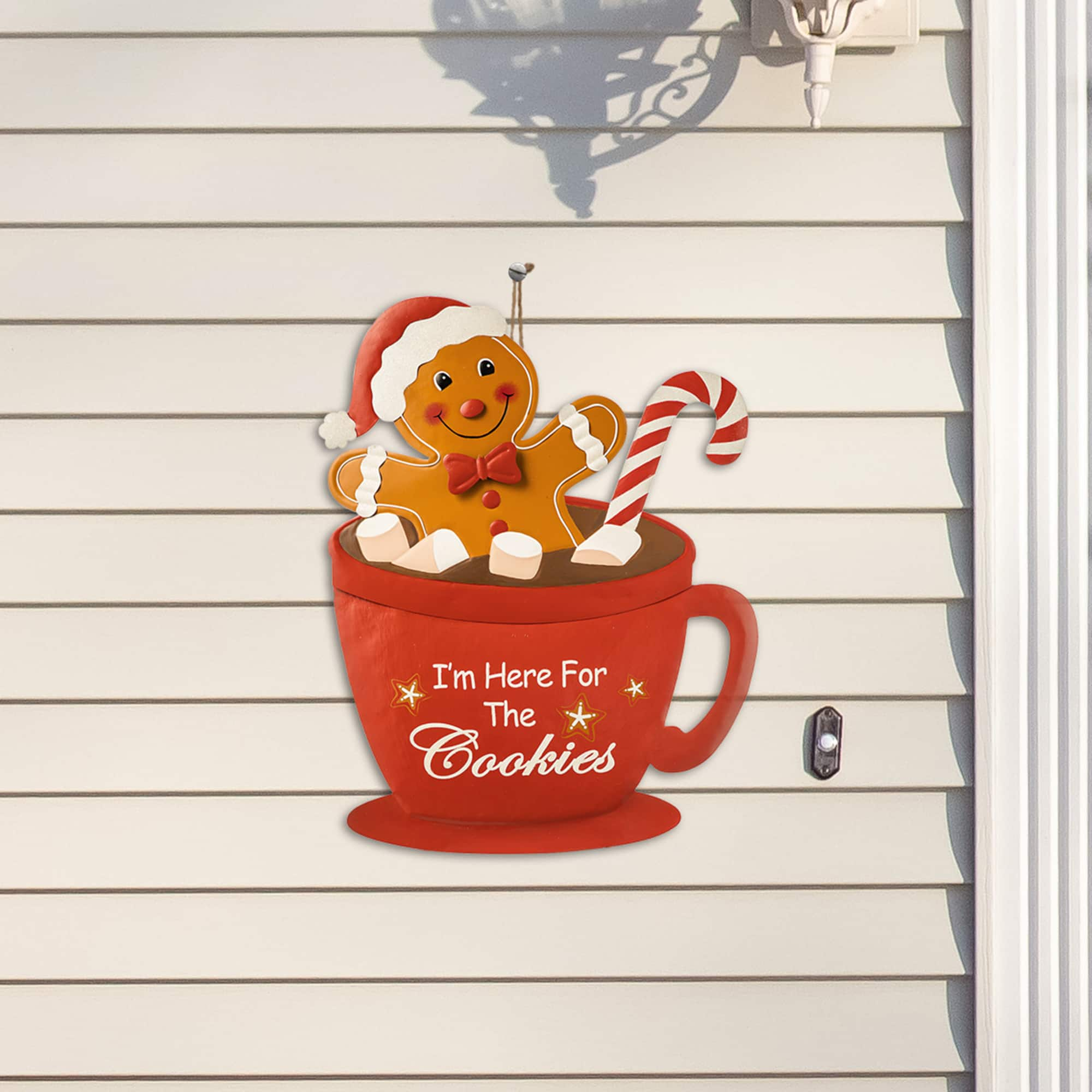 Glitzhome&#xAE; 30.25&#x22; Metal Gingerbread Man in Coffee Mug Yard Stake