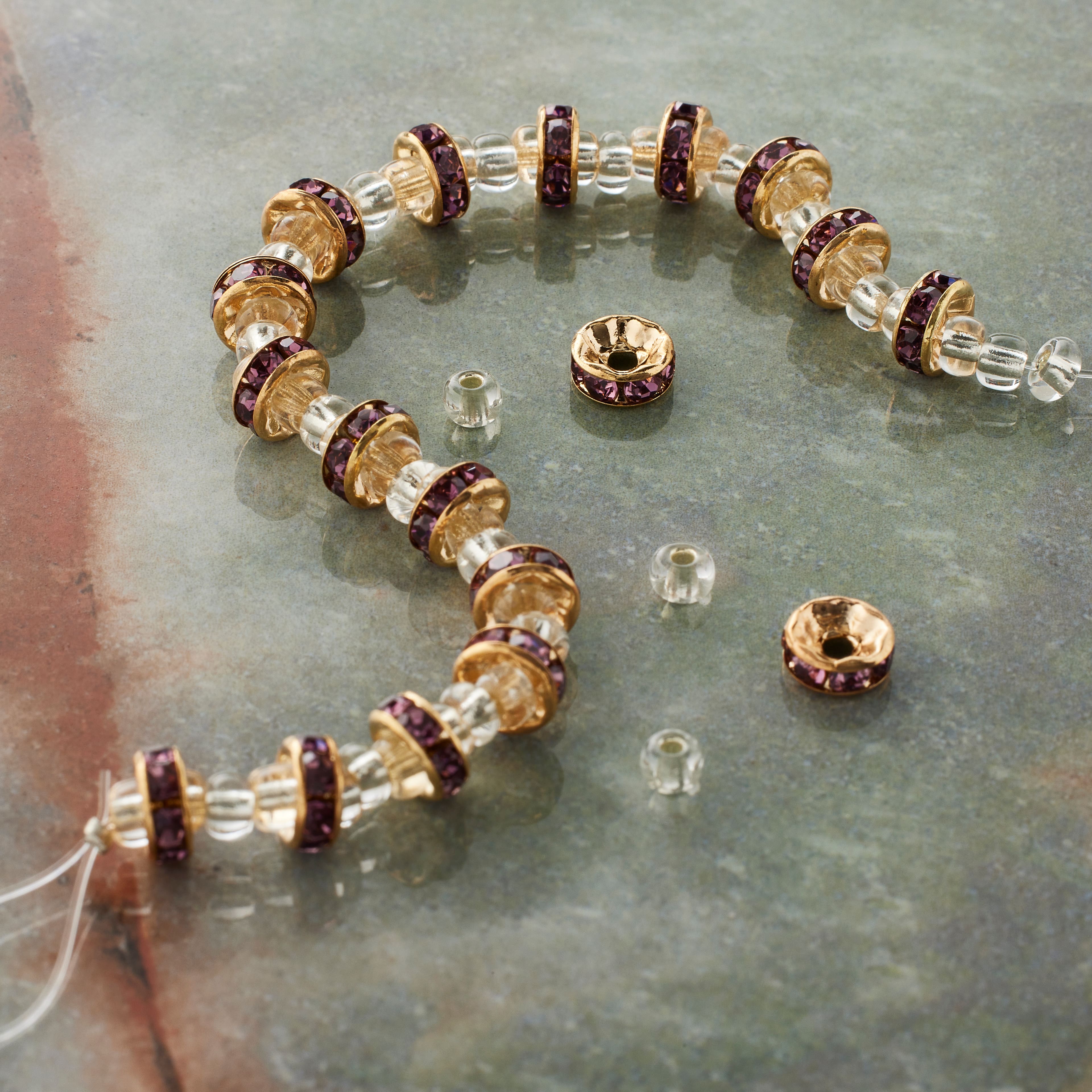 12 Pack: Glass Rhinestone & Metal Rondelle Beads, 6.7mm by Bead Landing­™