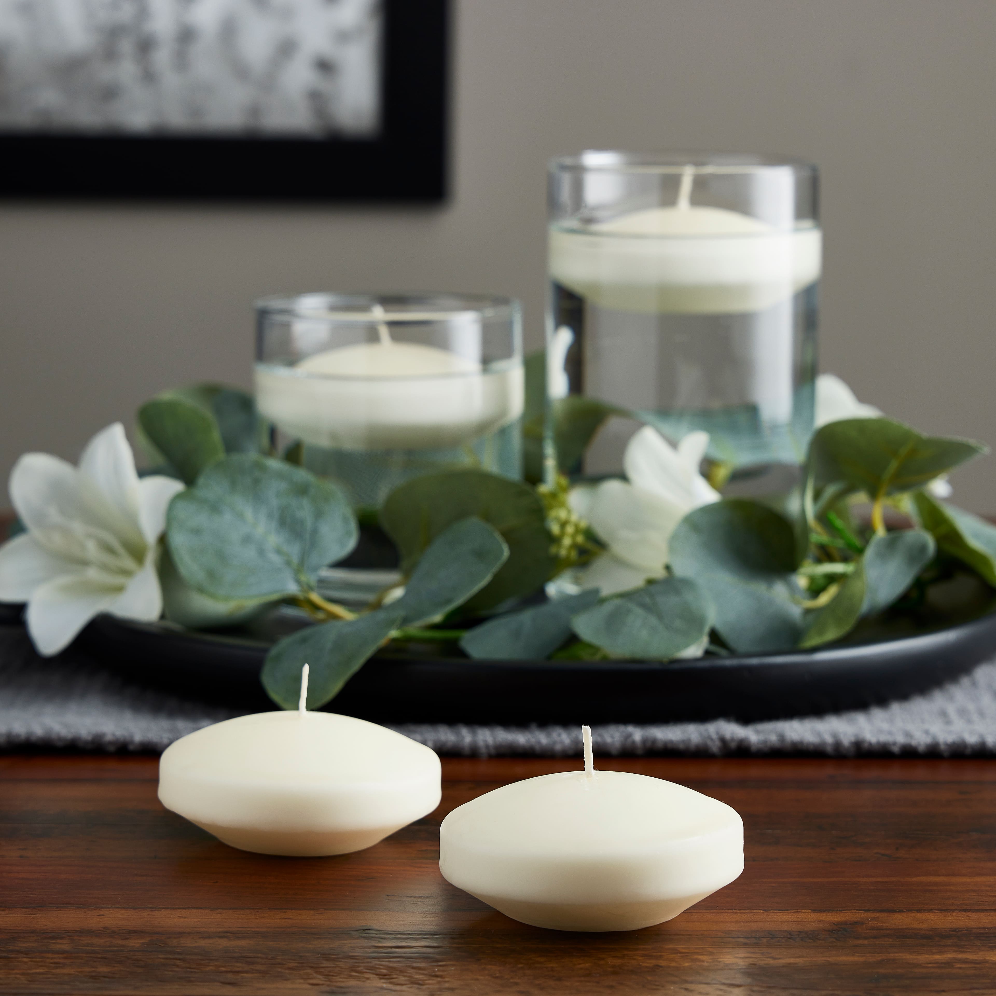 Basic Elements™ Ivory Floating Candles, 4ct. by Ashland®
