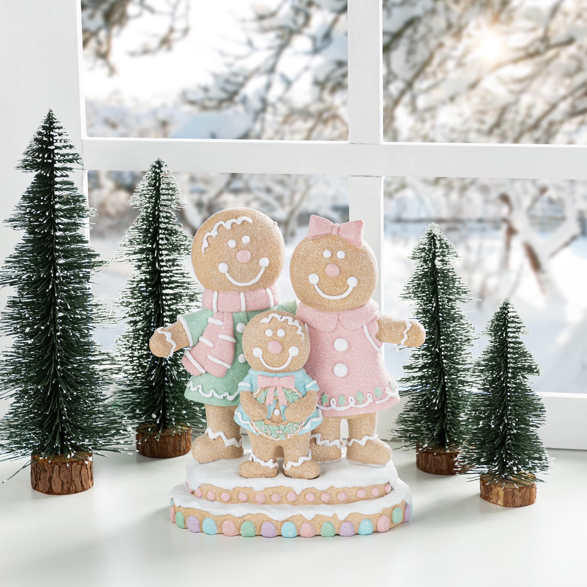 Glitzhome&#xAE; 10.25&#x22; Resin Christmas Gingerbread Man Family Table Decor