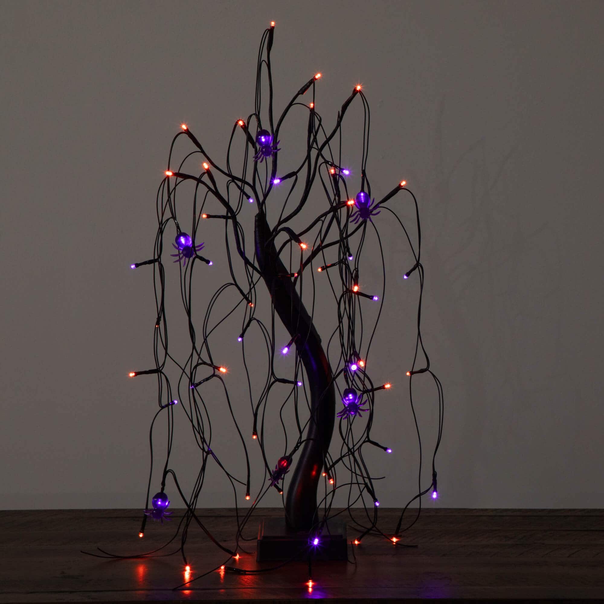 2ft. Pre-Lit Halloween Artificial Black Spooky Spider Willow Tree with 60 Orange &#x26; Purple LED Lights