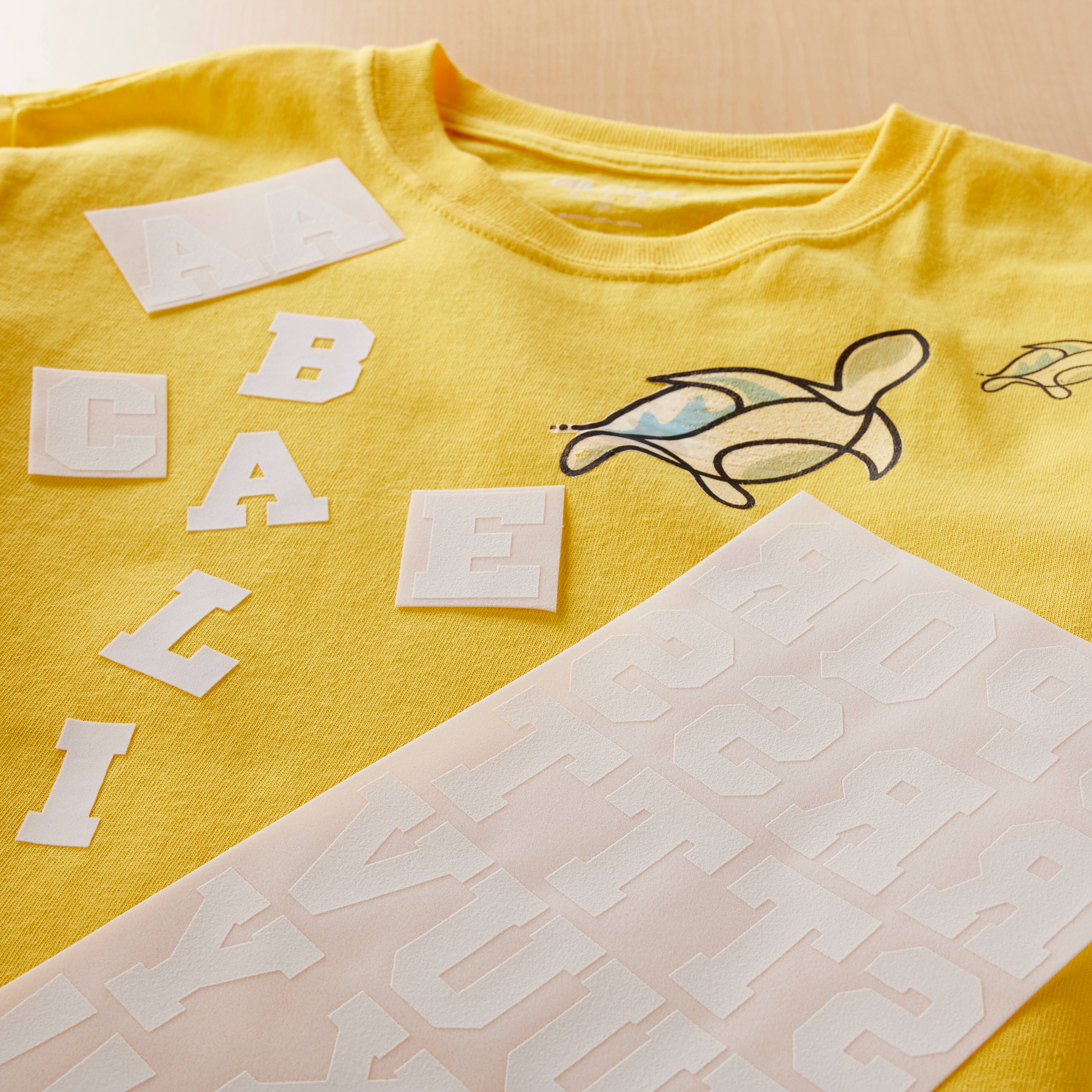 12 Pack: Iron-On White Flocked Athletic Letters by Imagin8™