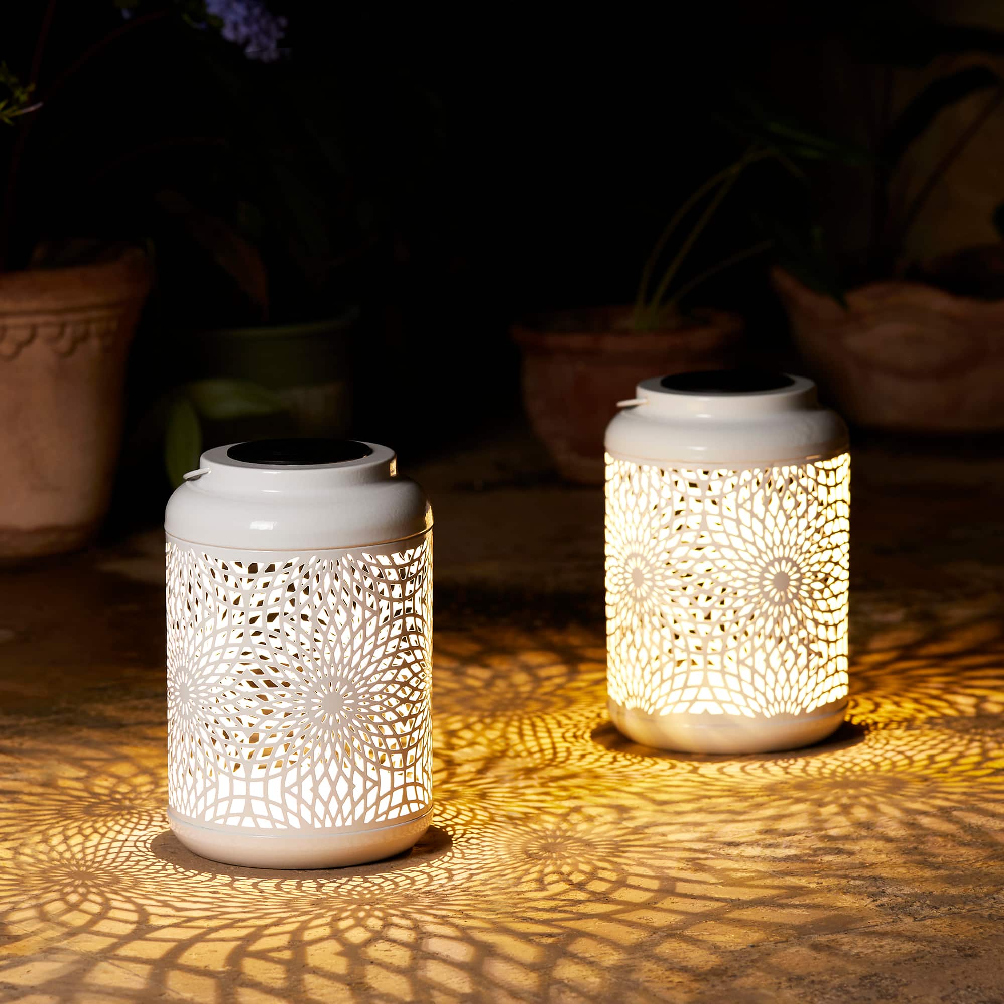 Glitzhome&#xAE; 8.75&#x22; Metal Cutout Solar Powered Hanging Lantern Set