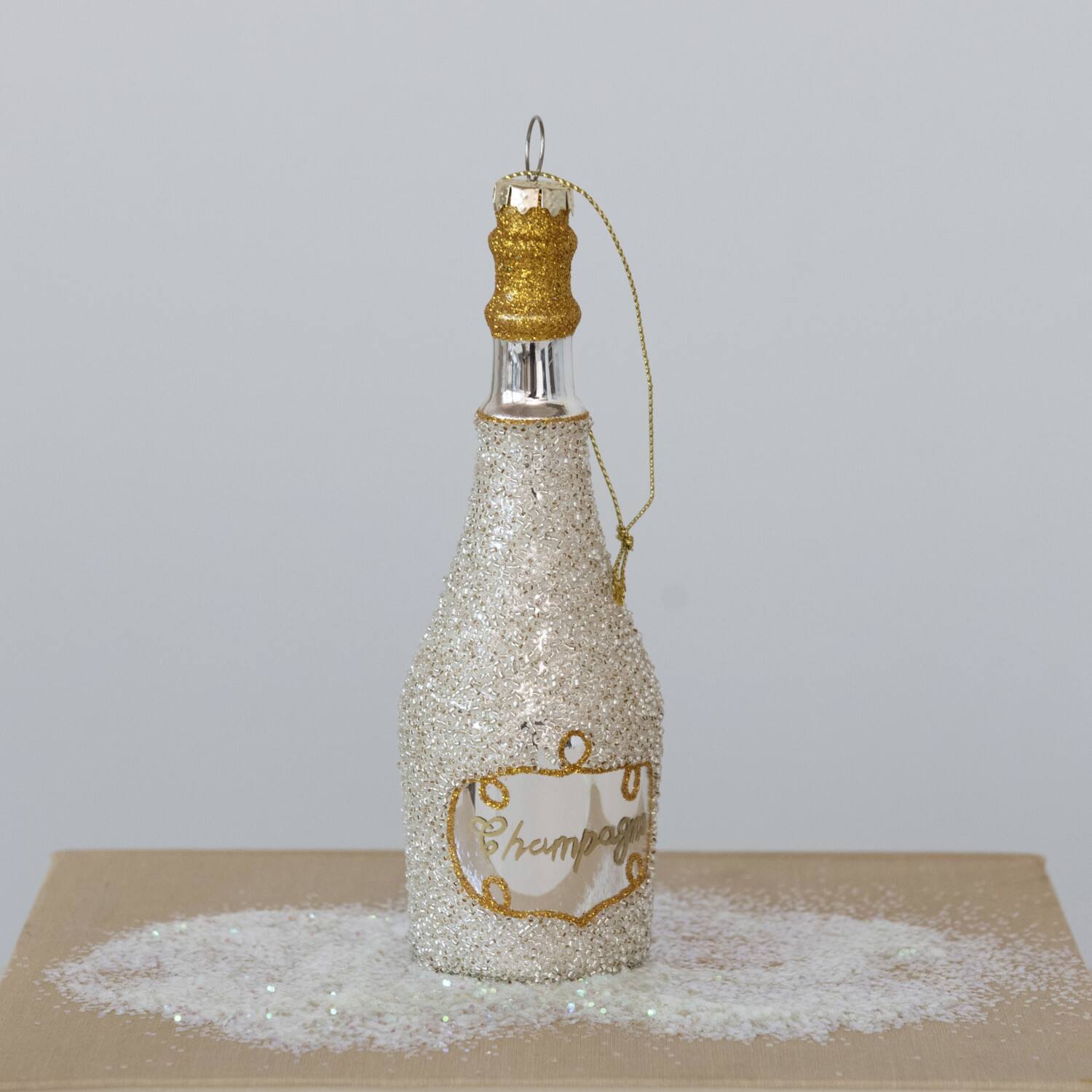 Hello Honey&#xAE; 6&#x22; Gold Glass Champagne Bottle Ornament
