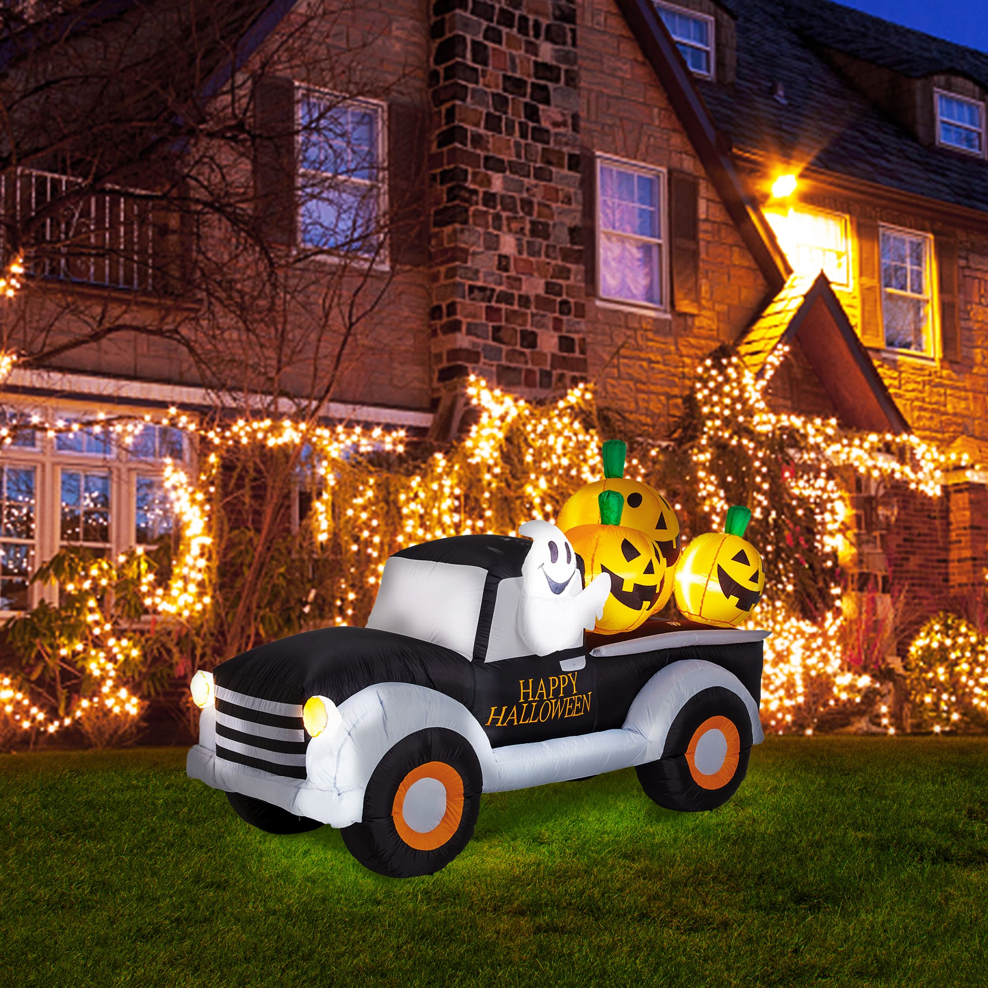 Glitzhome&#xAE; 8ft. Lighted Inflatable Truck With Jack-O-Lantern Pumpkins D&#xE9;cor