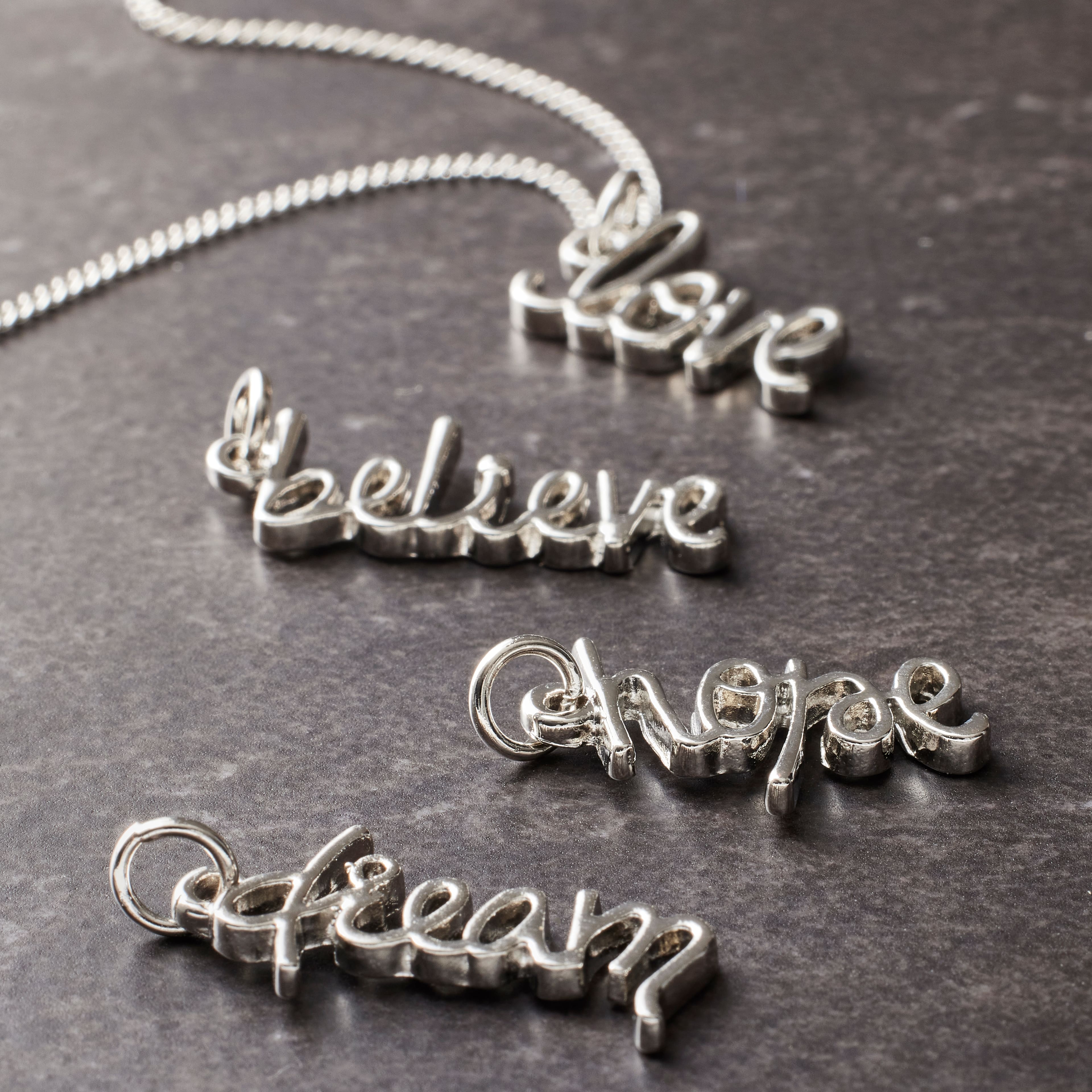 12 Packs: 4 ct. (48 total) Charmalong&#x2122; Vertical Script Word Charms by Bead Landing&#x2122;
