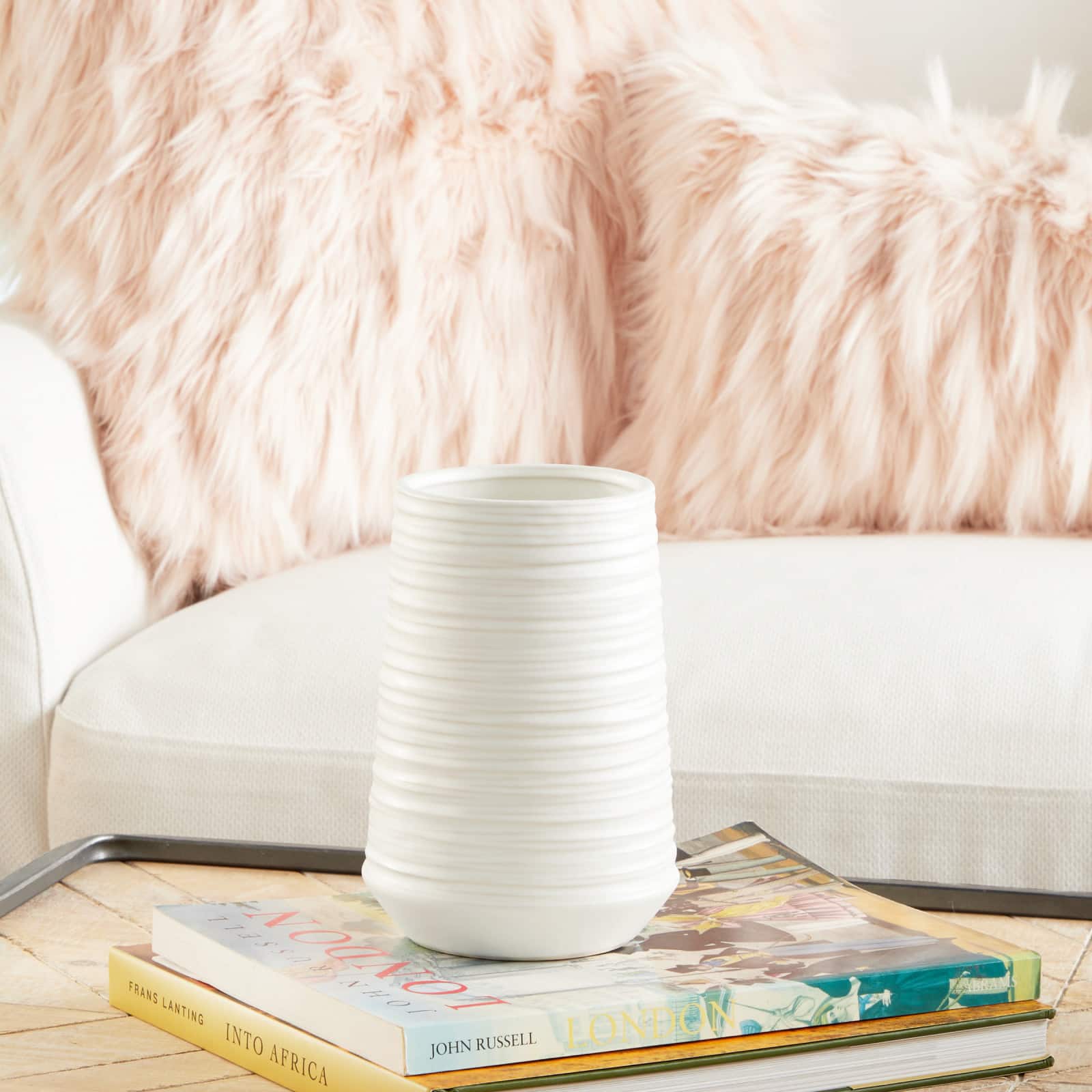 CosmoLiving by Cosmopolitan 7" White Porcelain Contemporary Vase