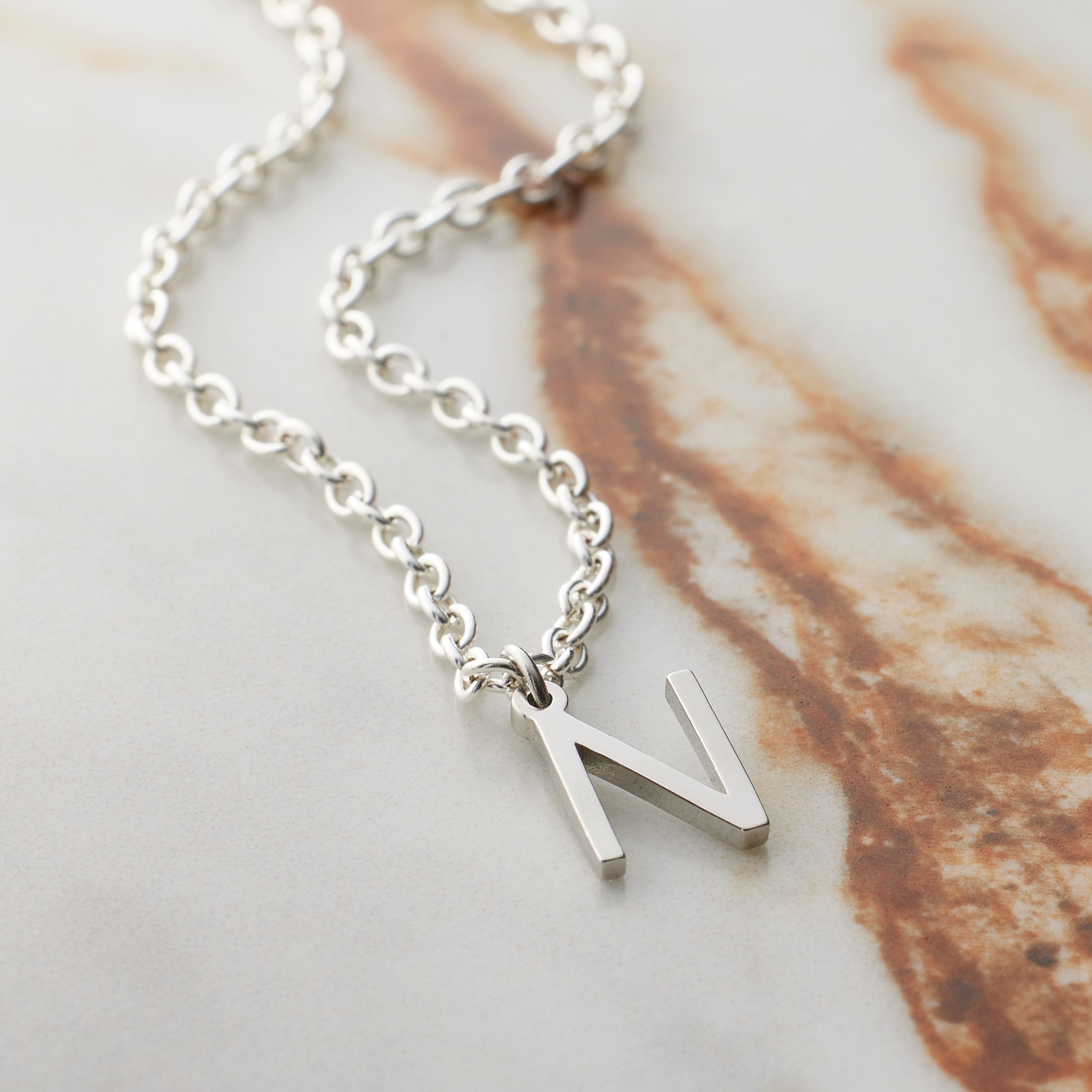 12 Pack: Sterling Silver Alphabet Charm by Bead Landing™