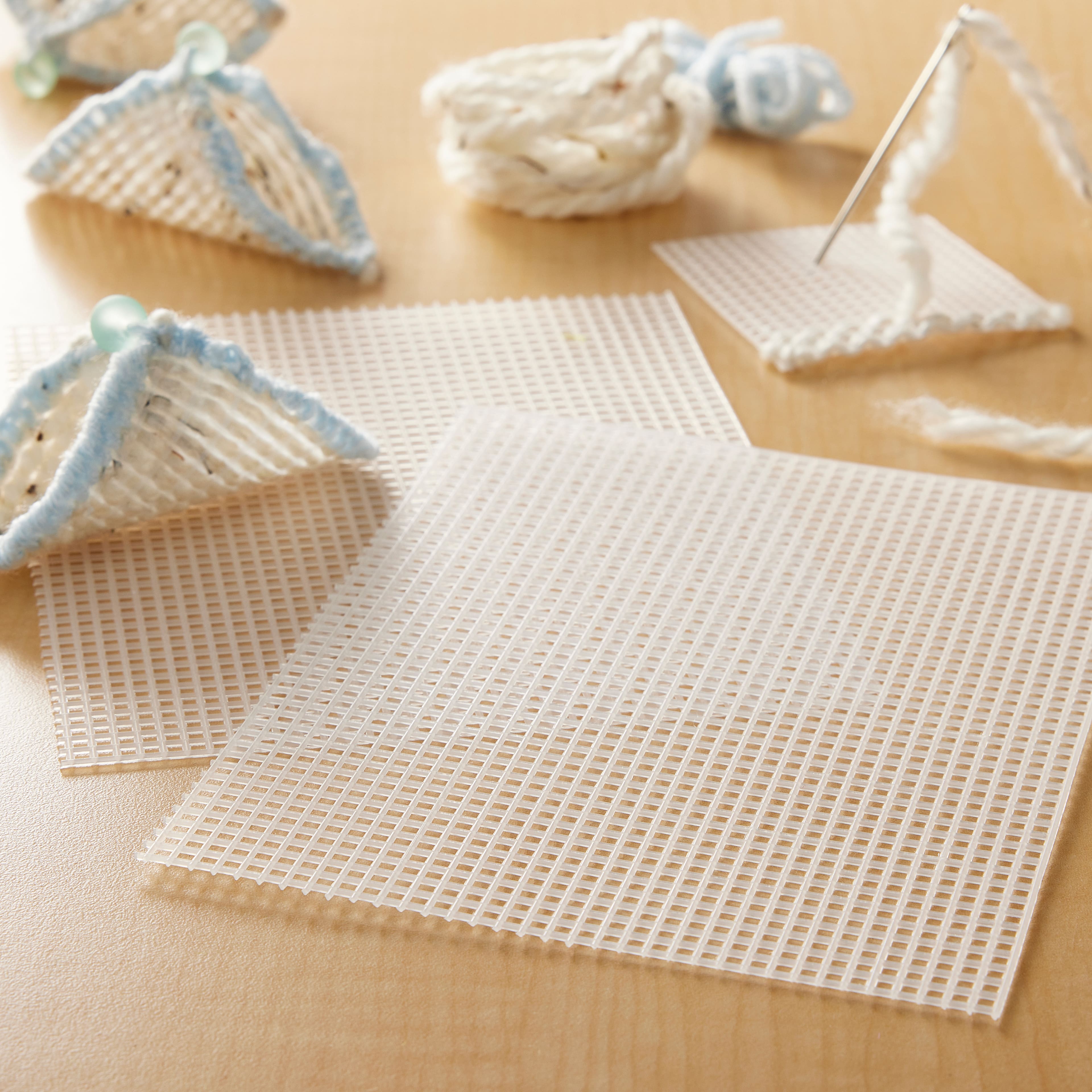 48 Pack: Clear 7 Mesh Plastic Canvas by Loops & Threads®