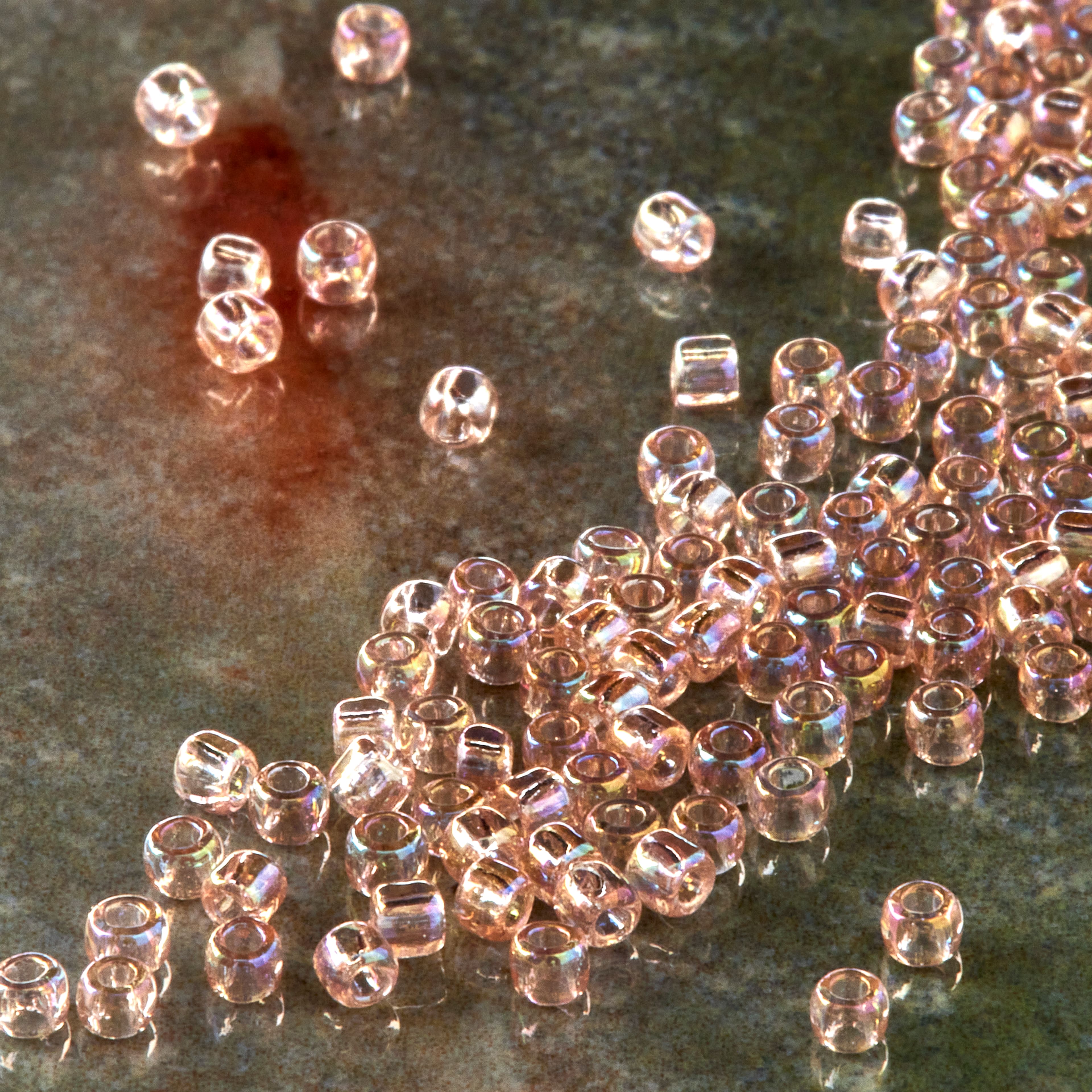 12 Pack: Toho® Iridescent Japanese Glass Seed Beads, 11/0