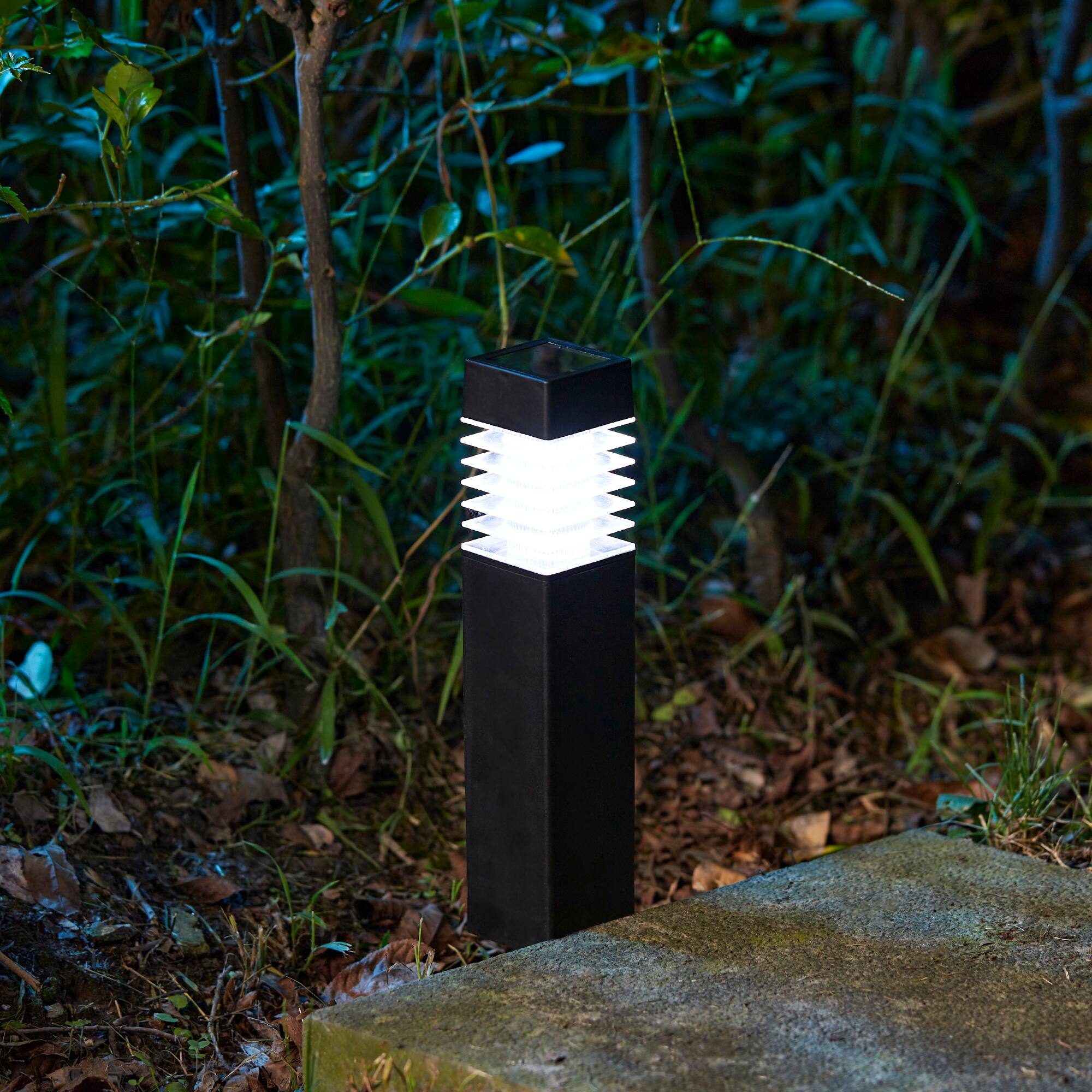 Glitzhome&#xAE; 15.25&#x22; Solar Powered Transparent Texture Lens Pathway Stake Lights, 6ct.