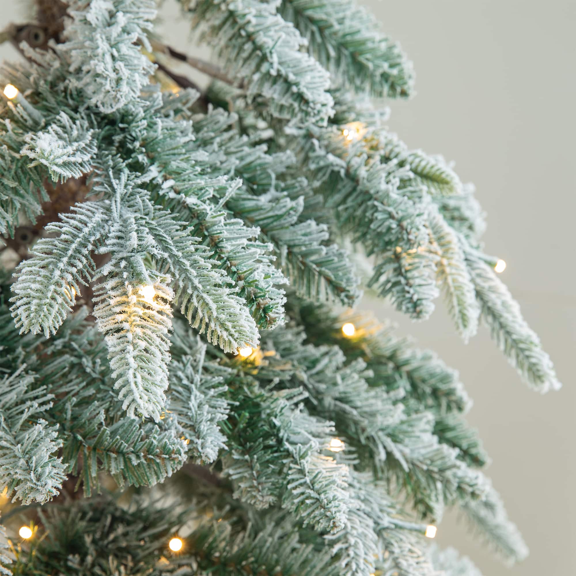 7.5ft. Pre-Lit Flocked Pencil Spruce Artificial Christmas Tree, Warm White LED Lights