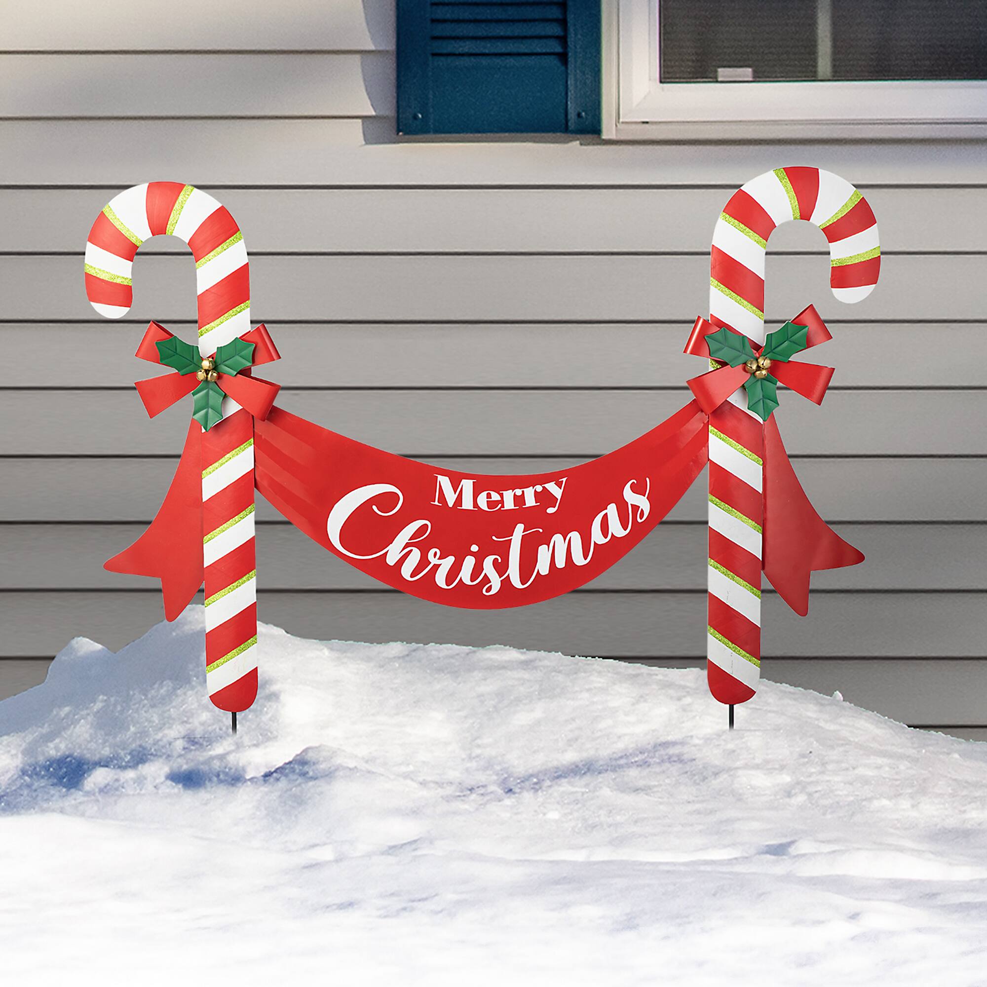 Glitzhome® 3ft. Merry Christmas Candy Cane Metal Yard Stake
