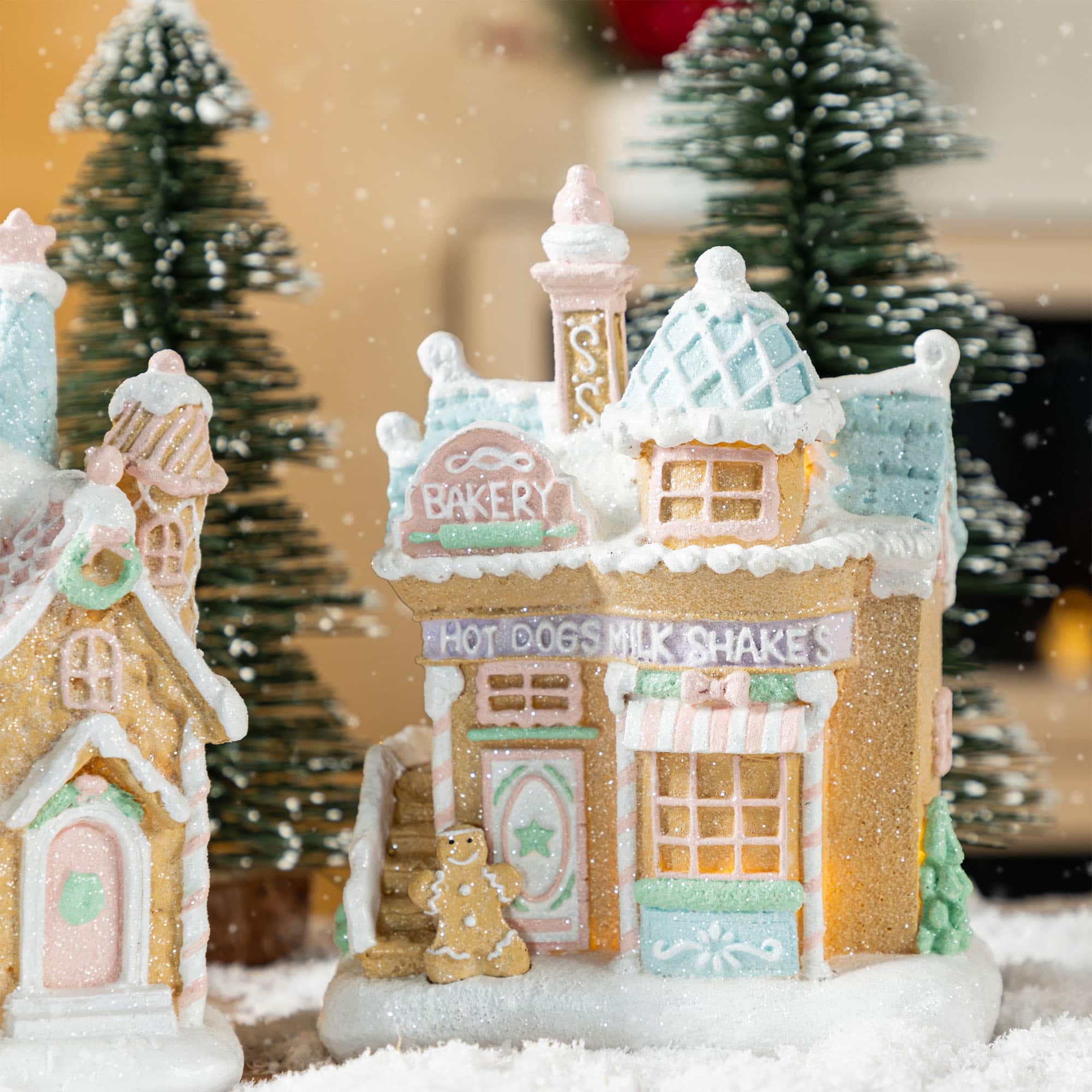Glitzhome&#xAE; 7&#x22; Christmas Macaron Resin Village Table Decor Set
