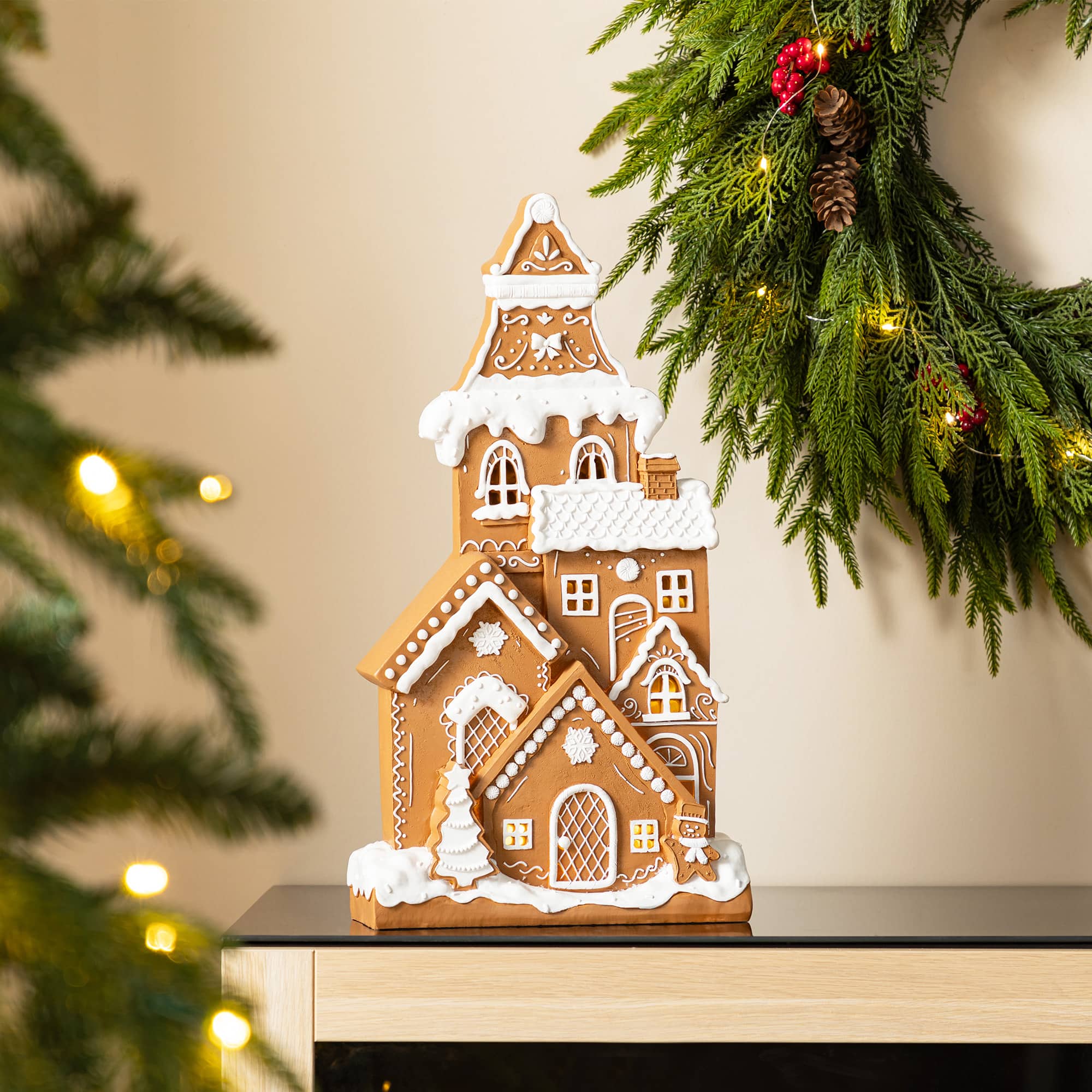 Glitzhome&#xAE; 17.75&#x22; Christmas Lighted Resin Gingerbread House Table Decor