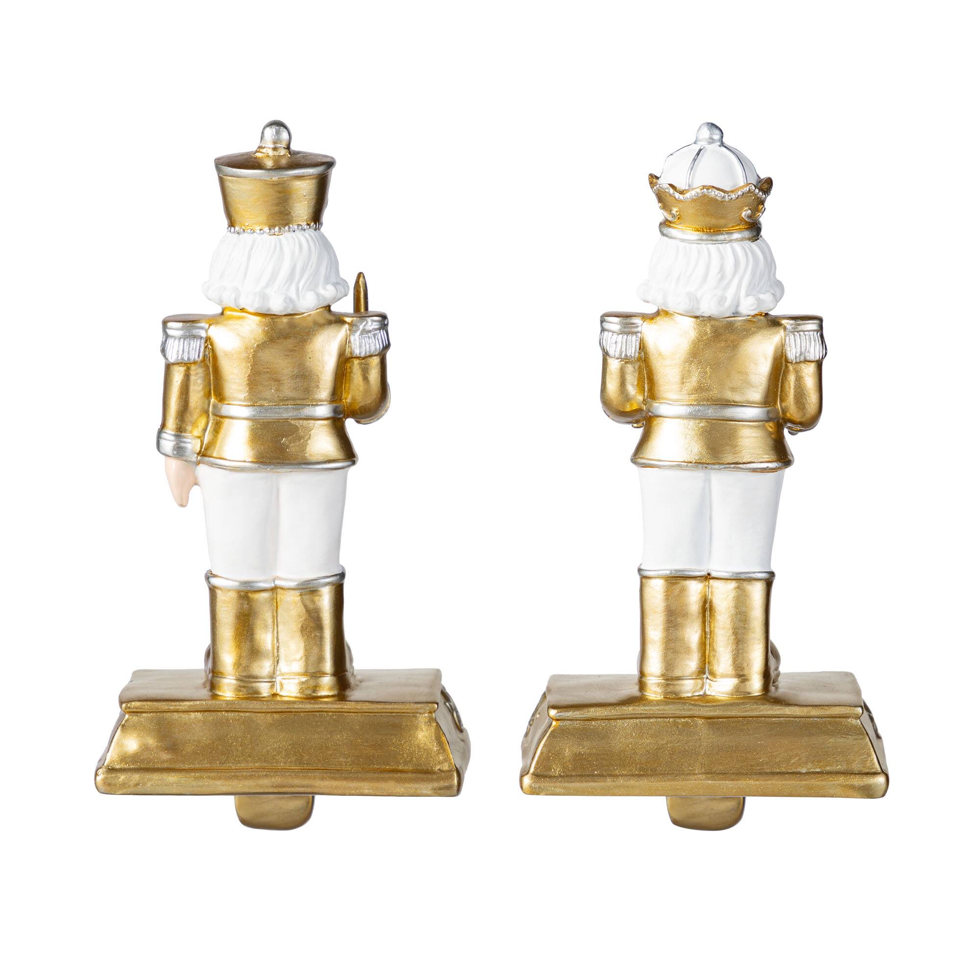 Glitzhome&#xAE; Christmas Resin Nutcracker Stocking Holder Set