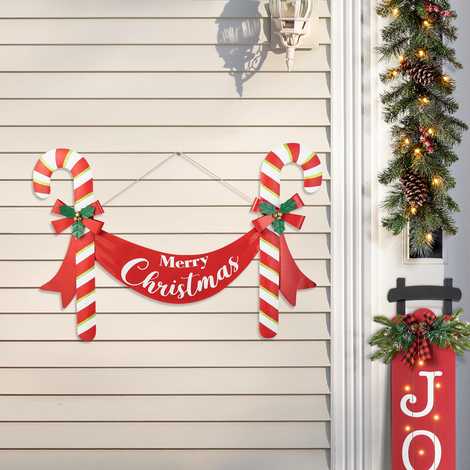 Glitzhome&#xAE; 3ft. Merry Christmas Candy Cane Metal Yard Stake