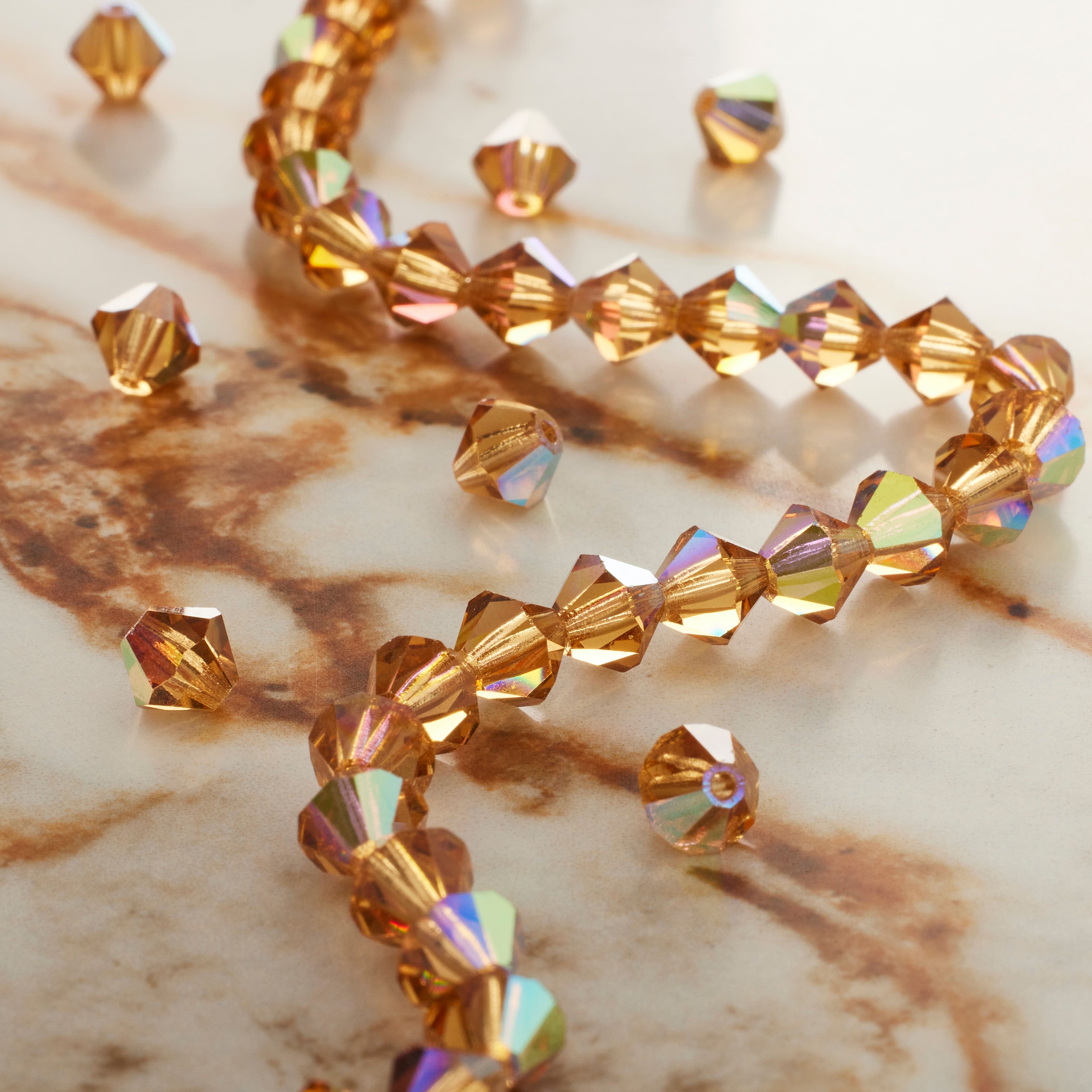 12 Pack: Preciosa Glass Crystal Bicone Beads, 6mm by Bead Landing™