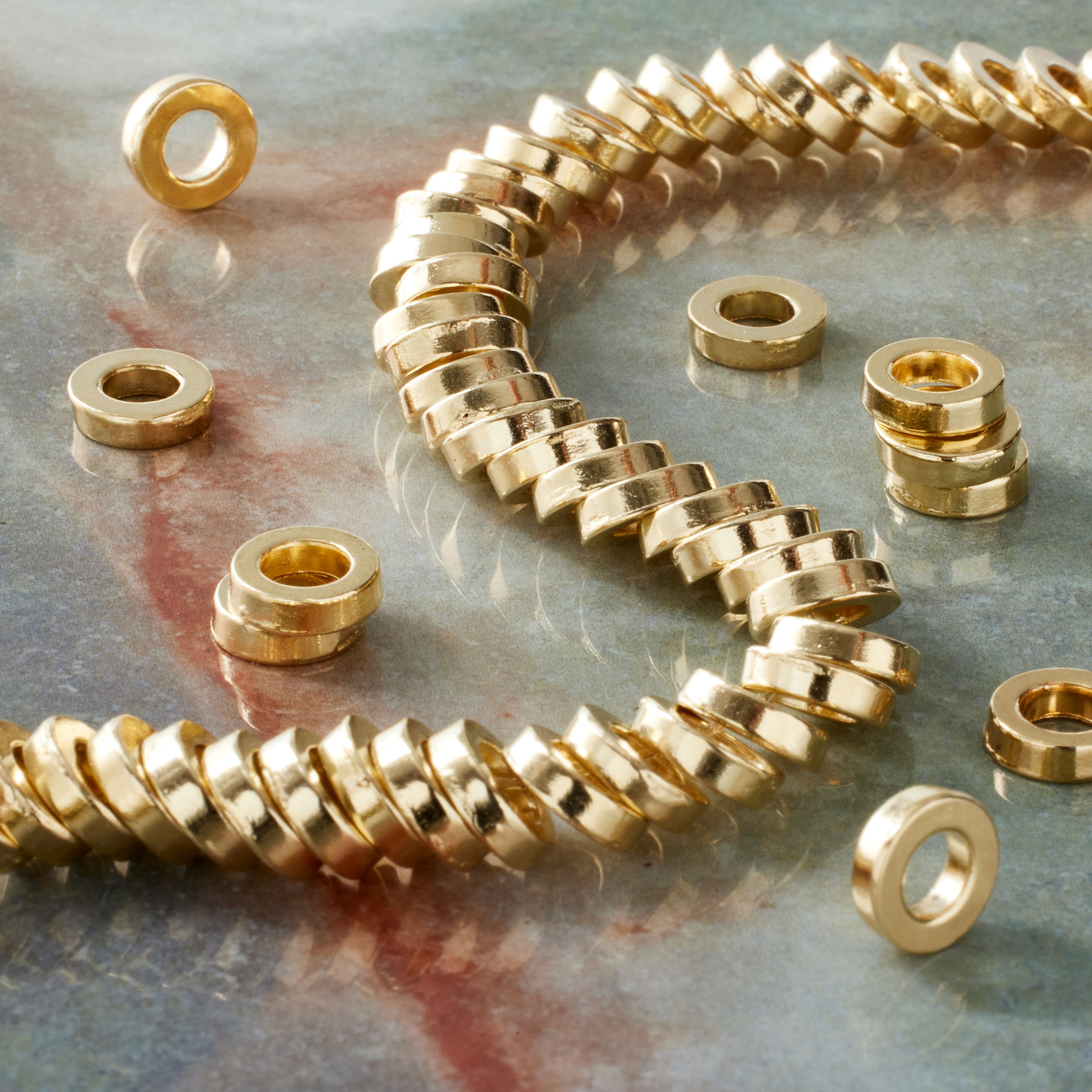 12 Pack: Gold Large Hole Metal Disc Spacer Beads by Bead Landing™