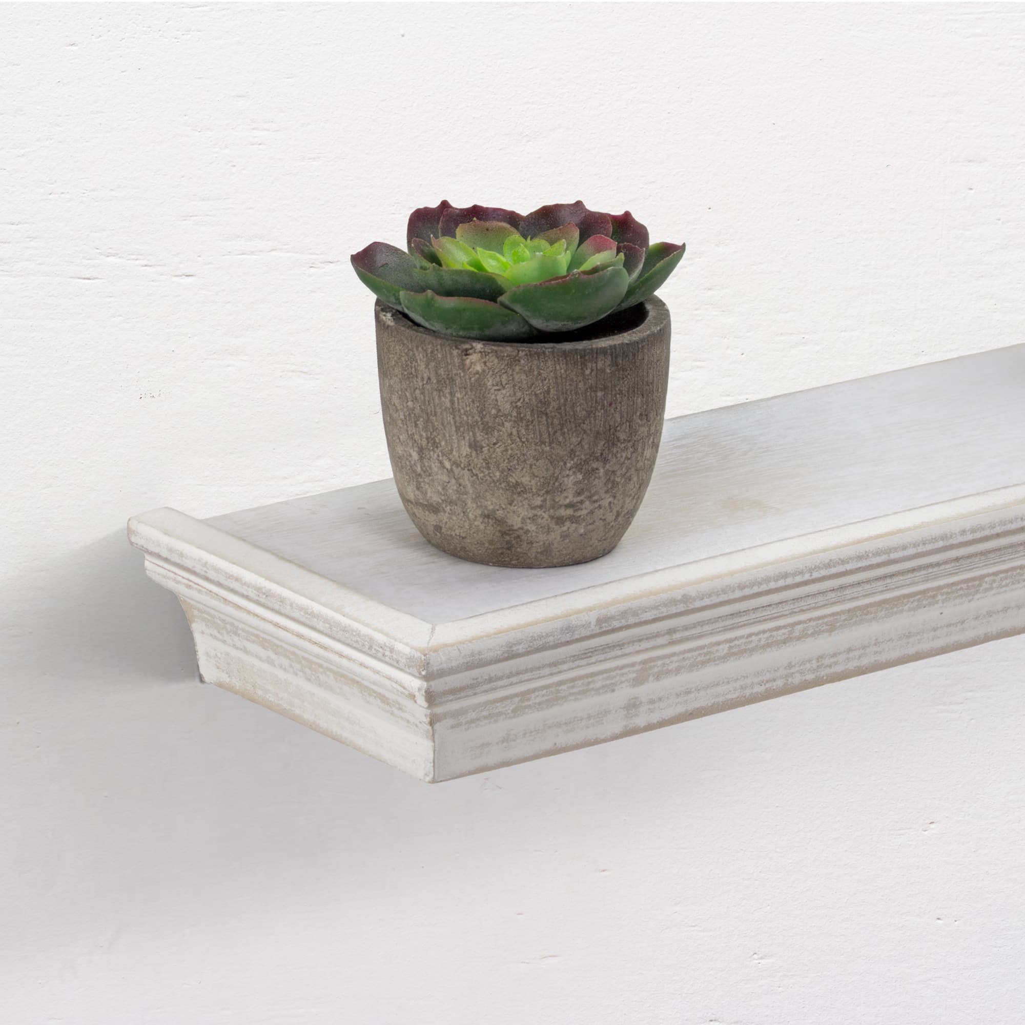 White Floating Shelves with Crown Molding