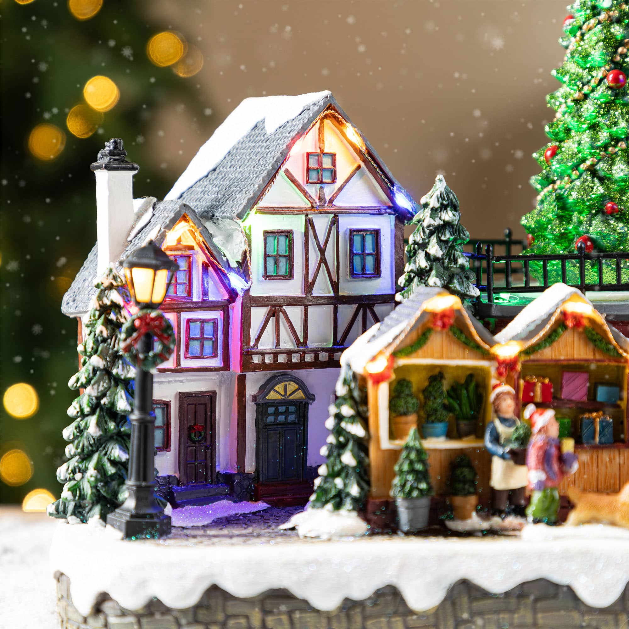 Glitzhome&#xAE; 15.25&#x22; Christmas Oversized Resin Lighted Table Village Decor