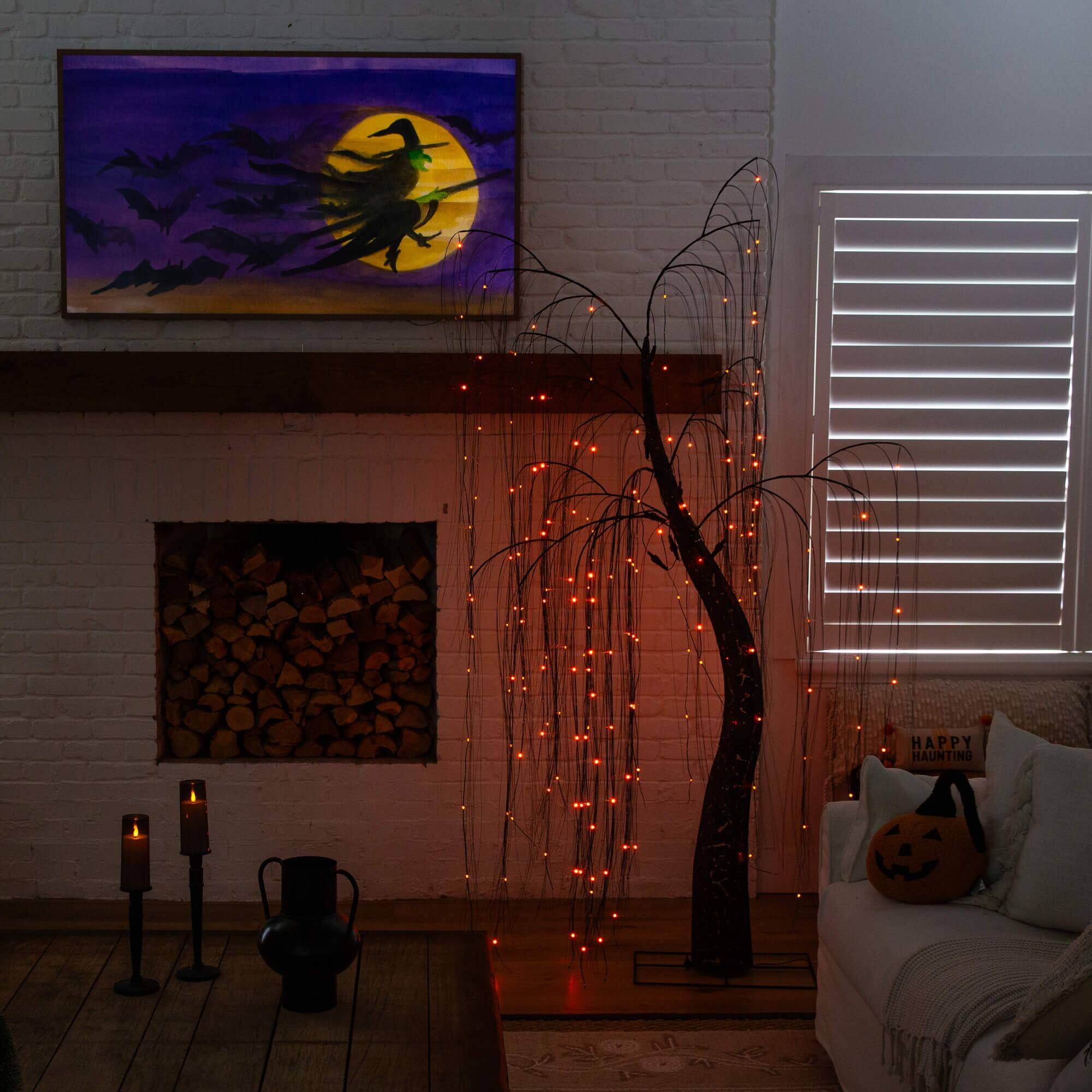 7ft. Pre-Lit Artificial Halloween Black Willow Tree with 600 Purple and Orange Dual Color LED Lights
