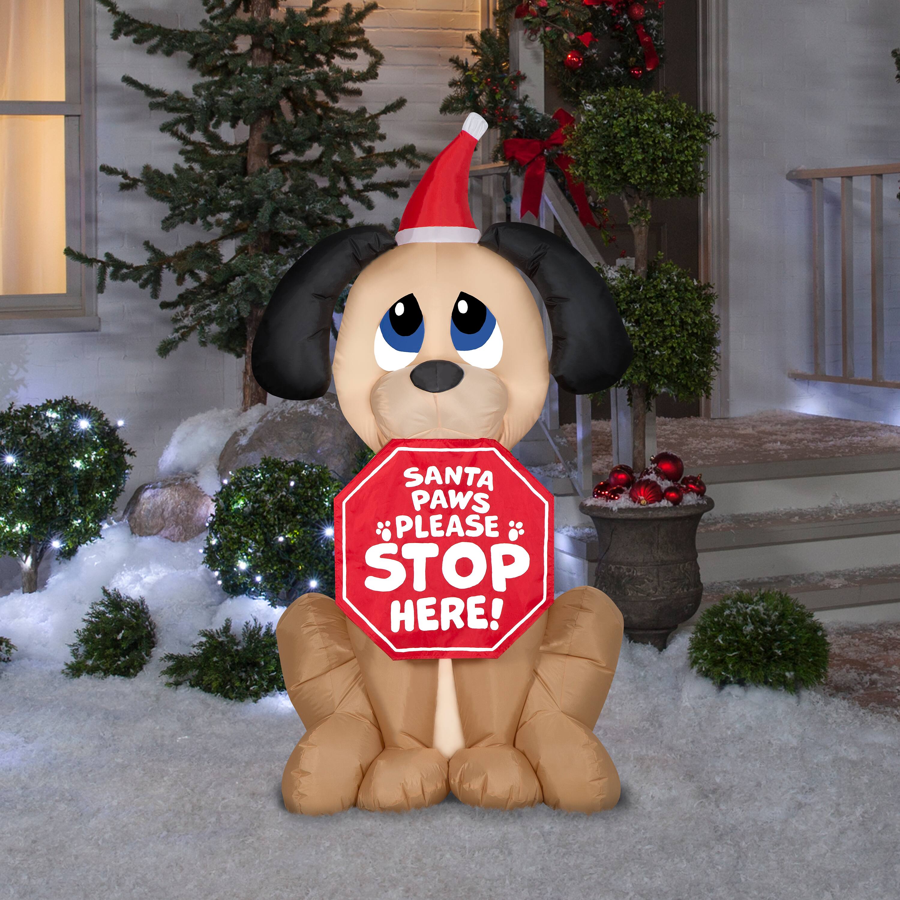 5ft. Airblown® Inflatable Christmas Dog with Santa Paws Sign