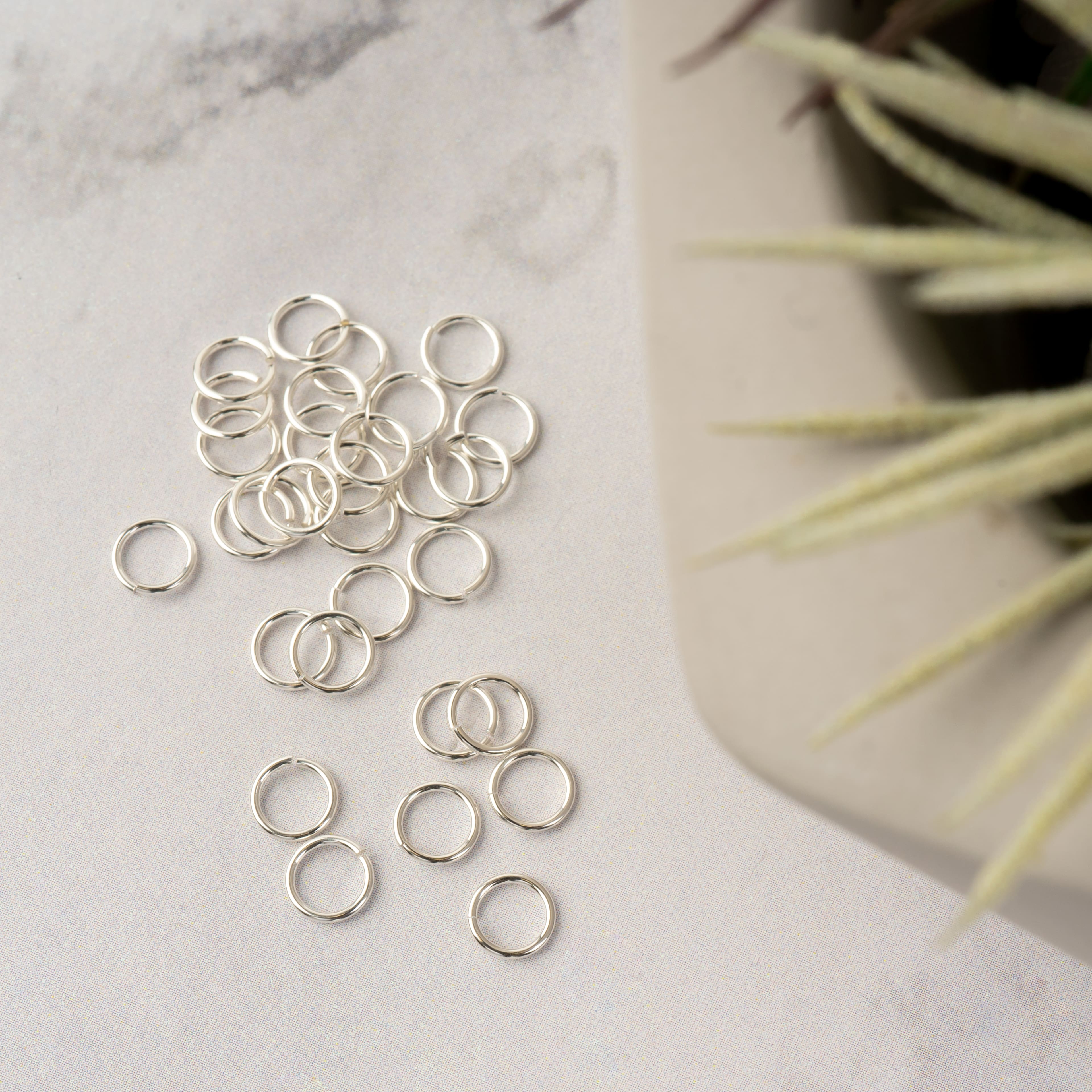 12 Packs: 30 ct. (360 total) Sterling Silver Jump Rings by Bead Landing™