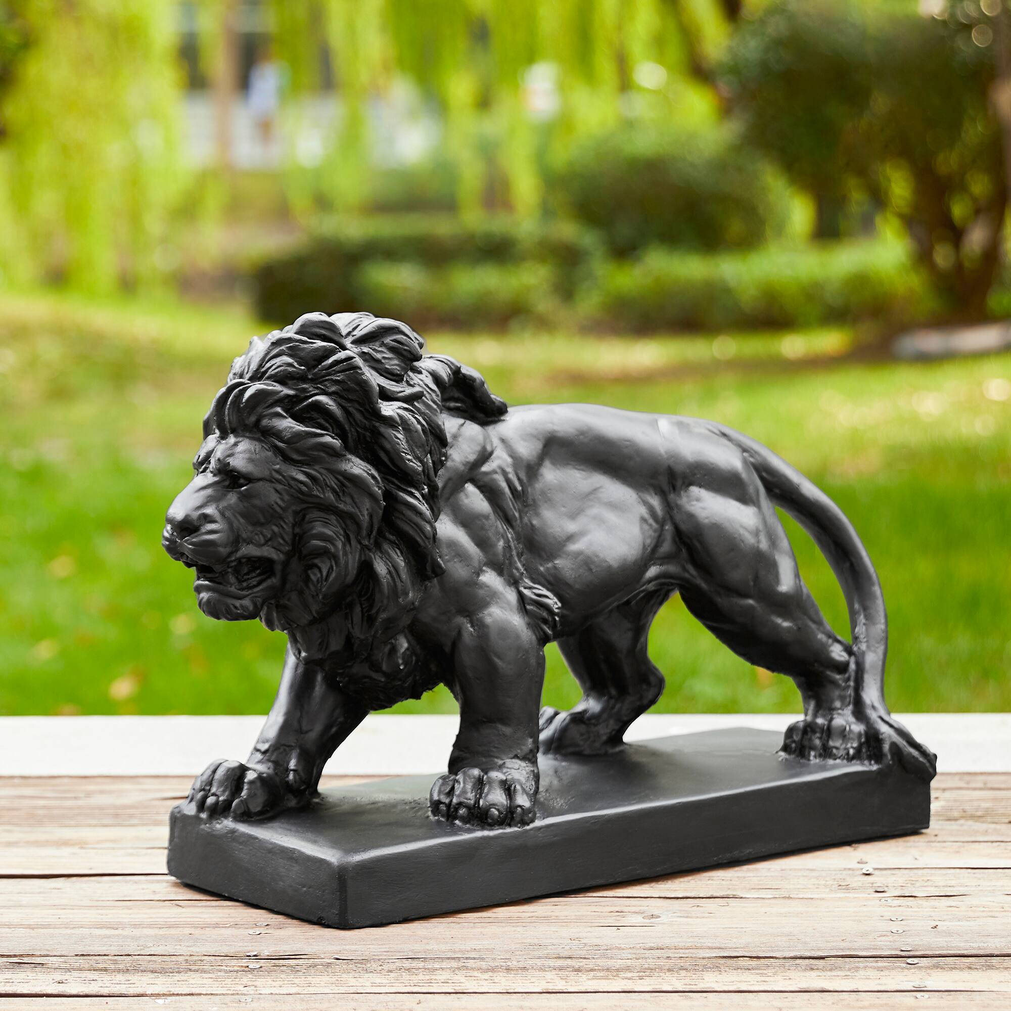 Glitzhome&#xAE; 24.5&#x22; Walking Lion Garden Statue