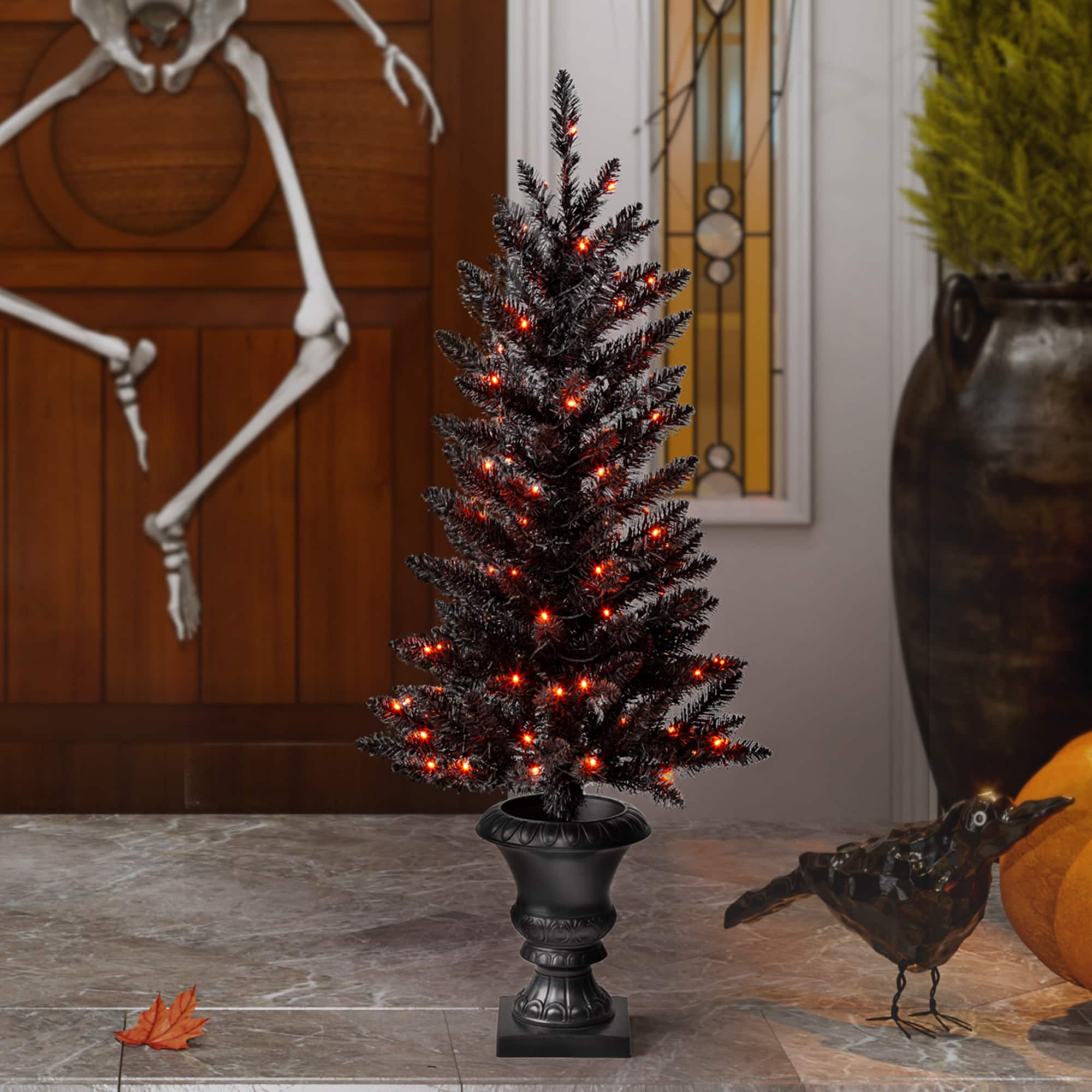4ft. Pre-Lit Black Artificial Halloween Tree, LED Orange Lights