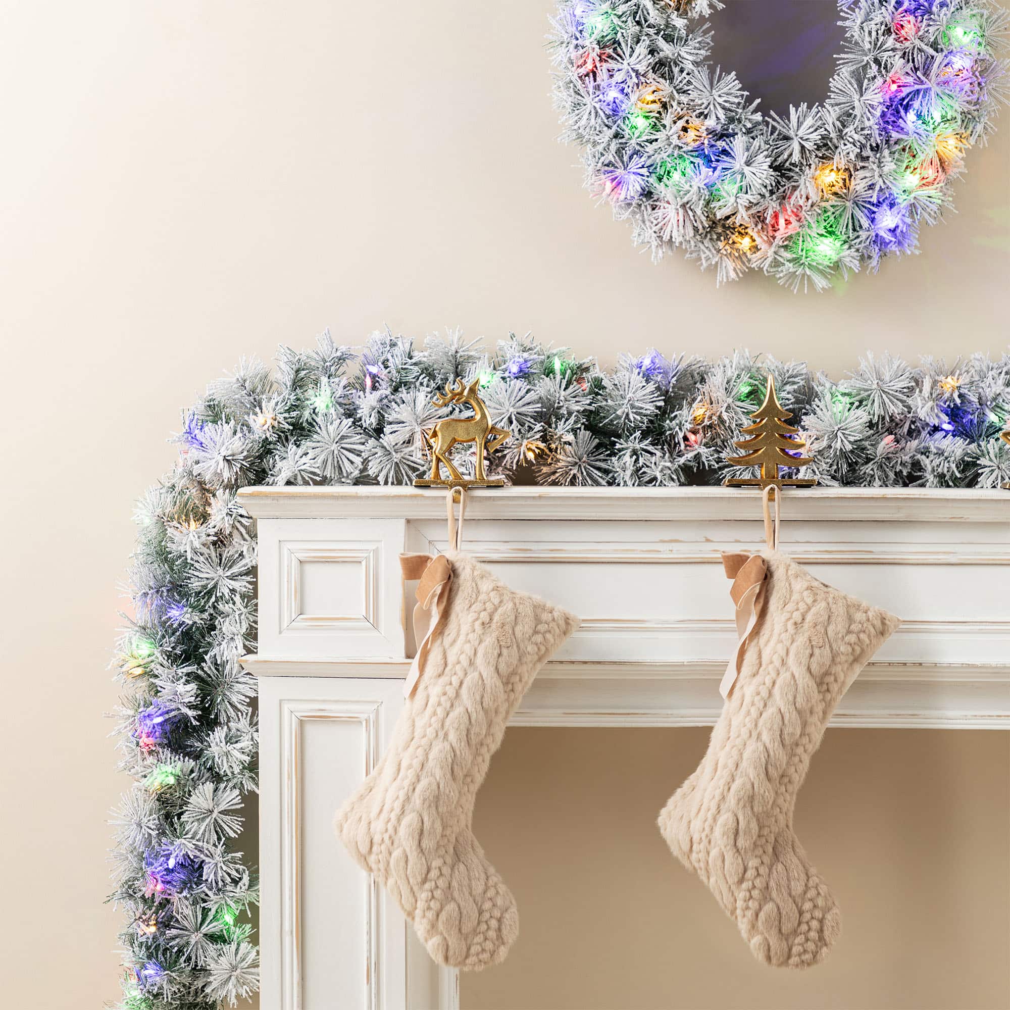 Glitzhome&#xAE; 9ft Pre-Lit Snow Flocked Greenery Pine Christmas Garland with Timer