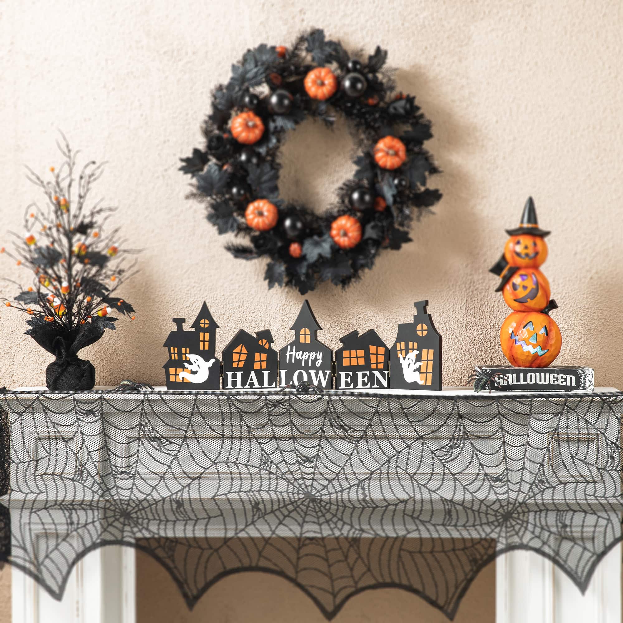 Glitzhome&#xAE; 2ft. Halloween Hinged Haunted House Table D&#xE9;cor