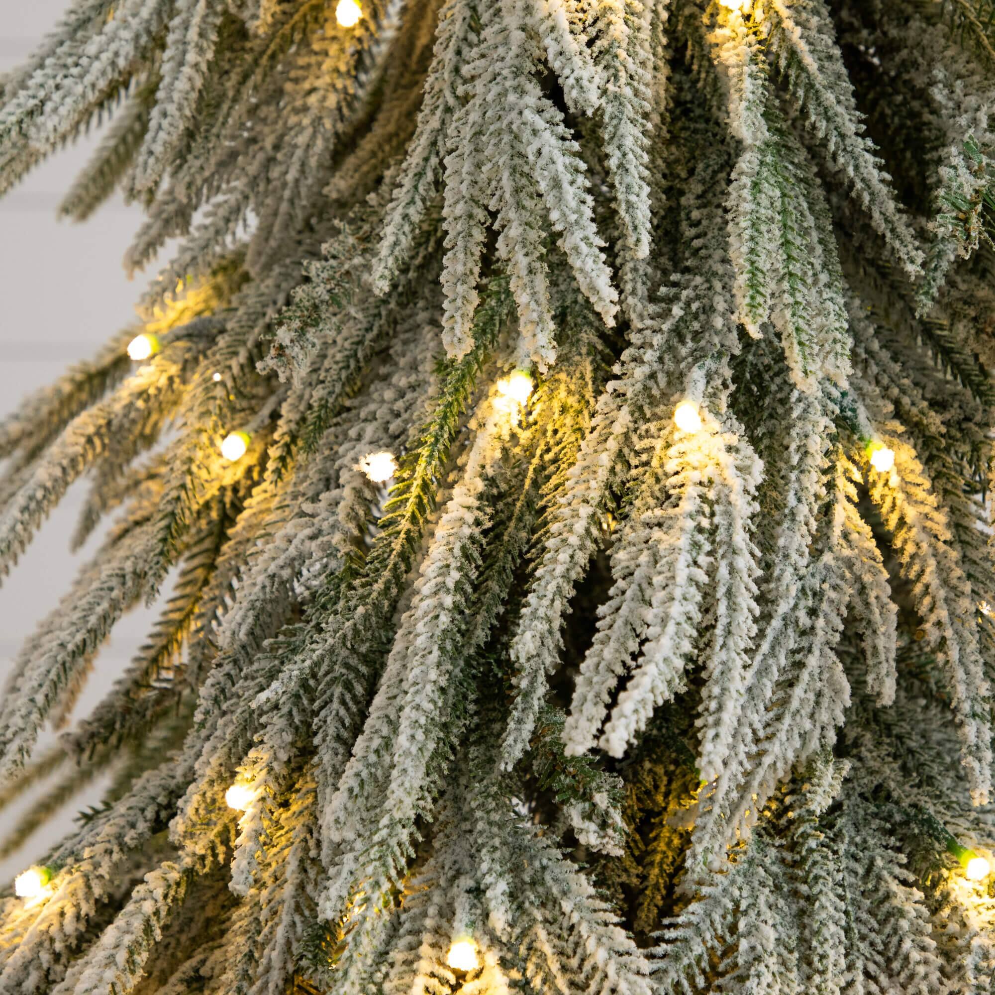 4ft. Pre-Lit Down Swept Flocked Fir Artificial Christmas Tree, Warm White LED Lights