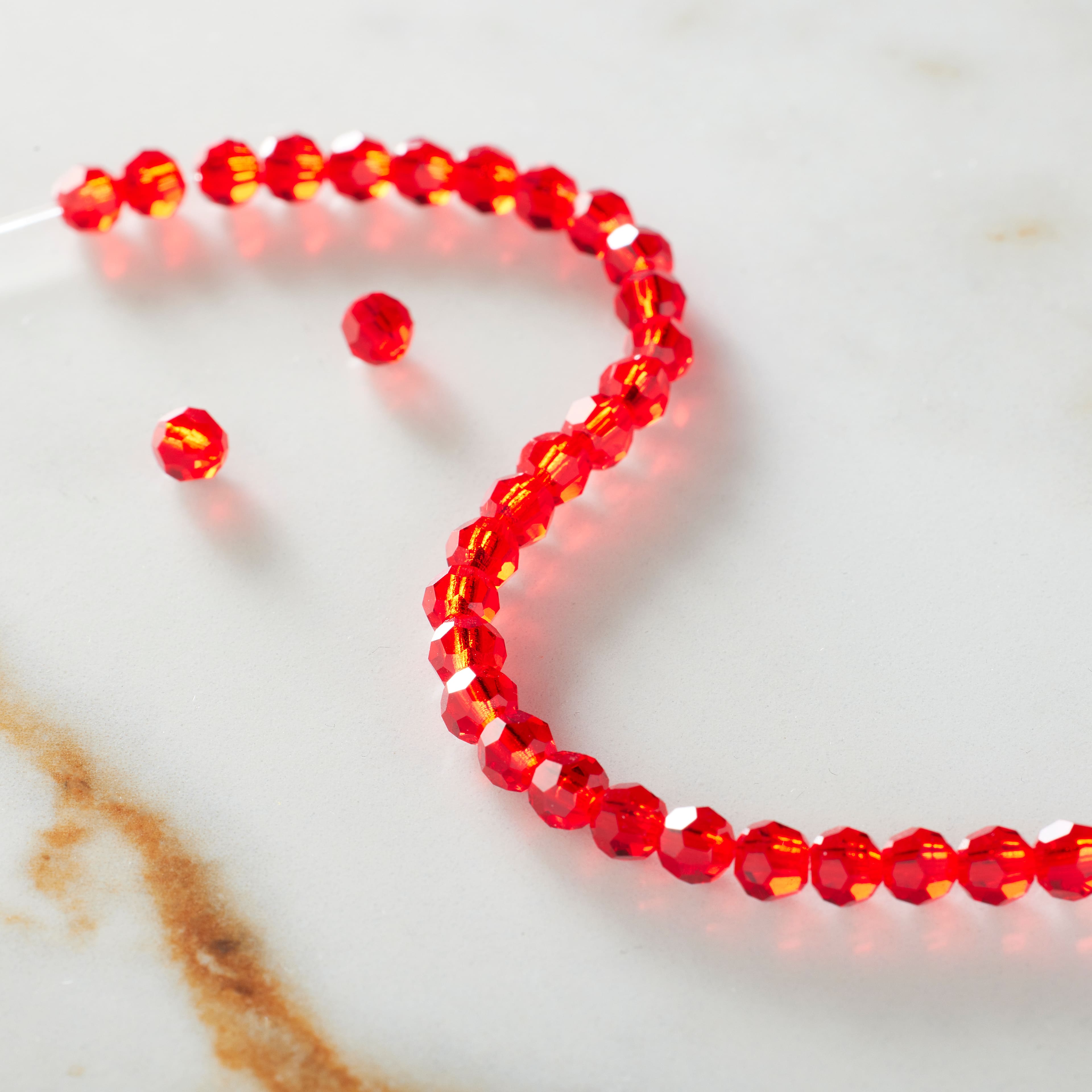 12 Packs: 31 ct. (372 total) Preciosa Glass Crystal Round Beads, 4mm by Bead Landing™