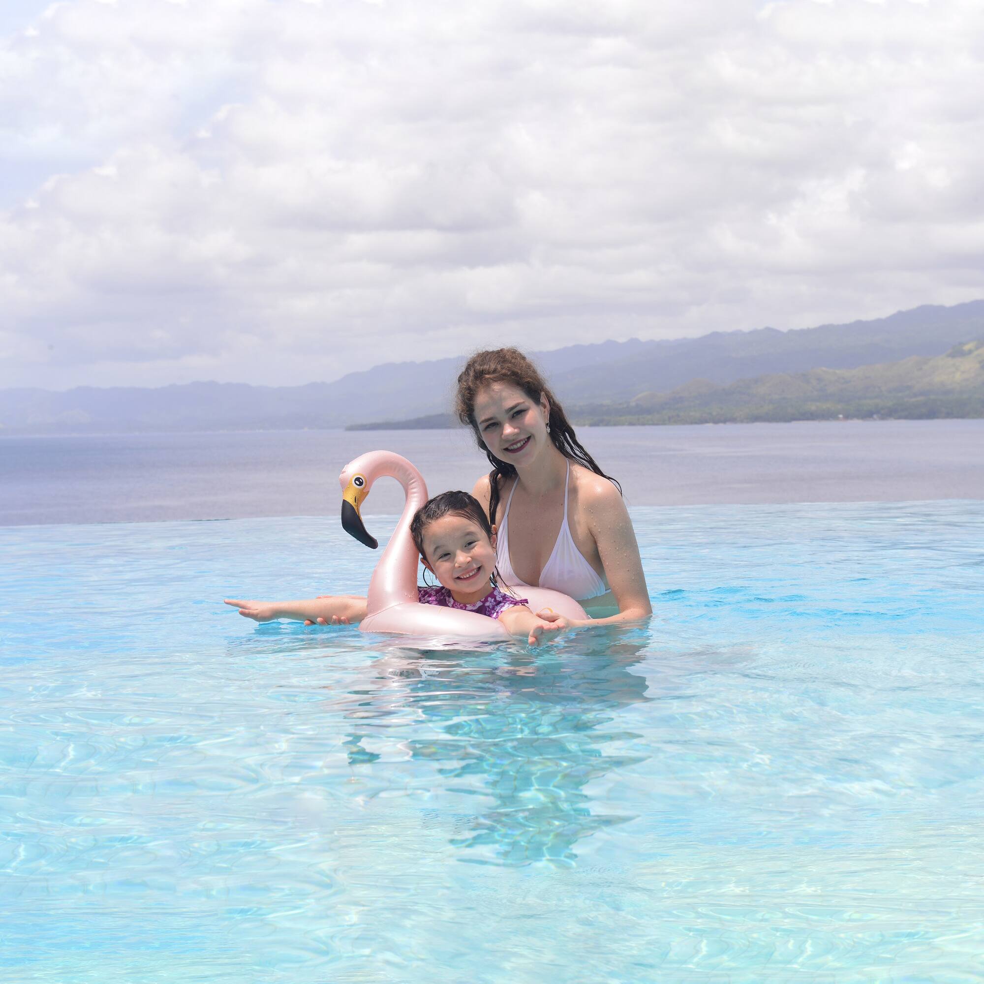 Pool Central® 24" Pink Inflatable Flamingo Swimming Pool Ring Float