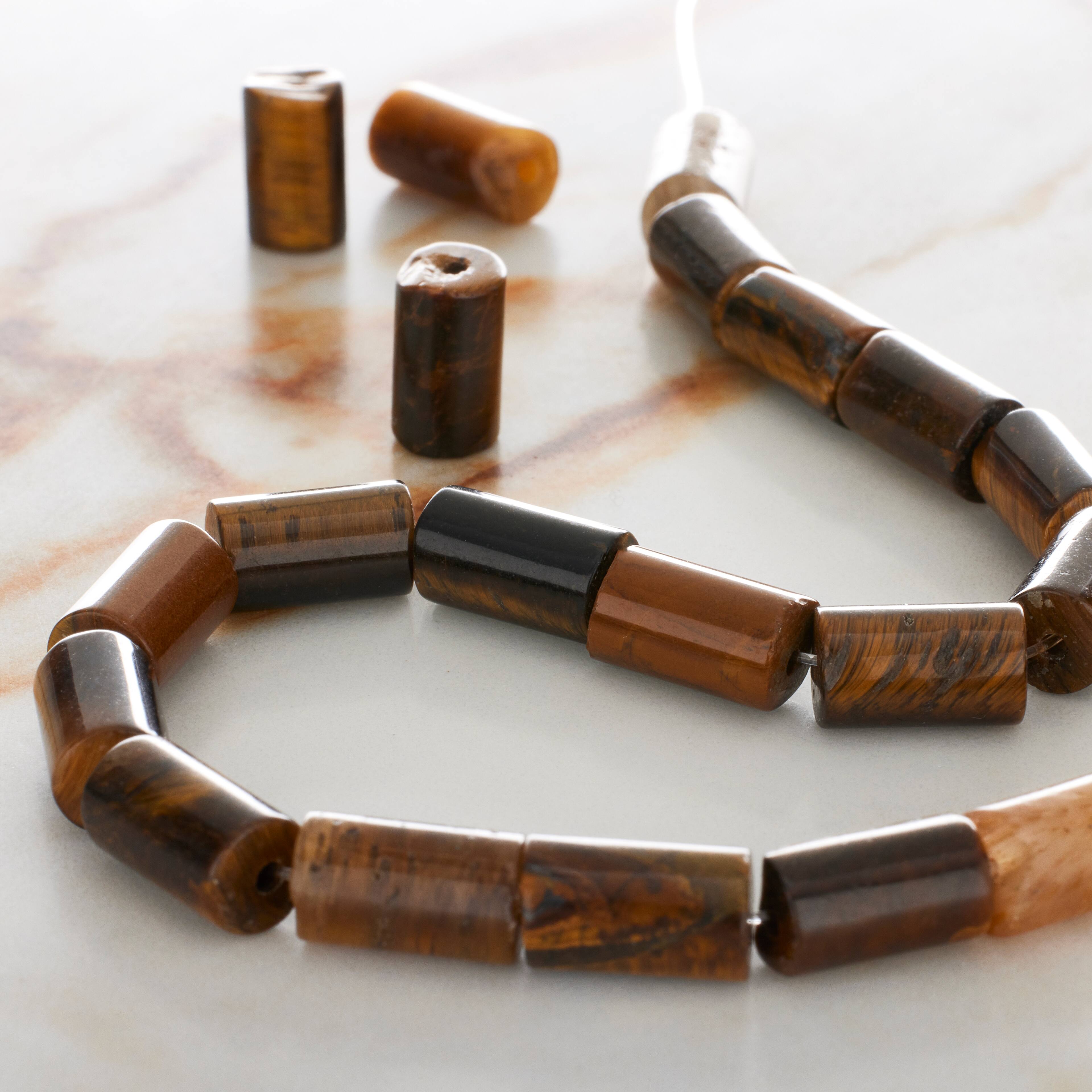 12 Pack: Yellow Tiger&#x27;s Eye Tube Beads by Bead Landing&#x2122;