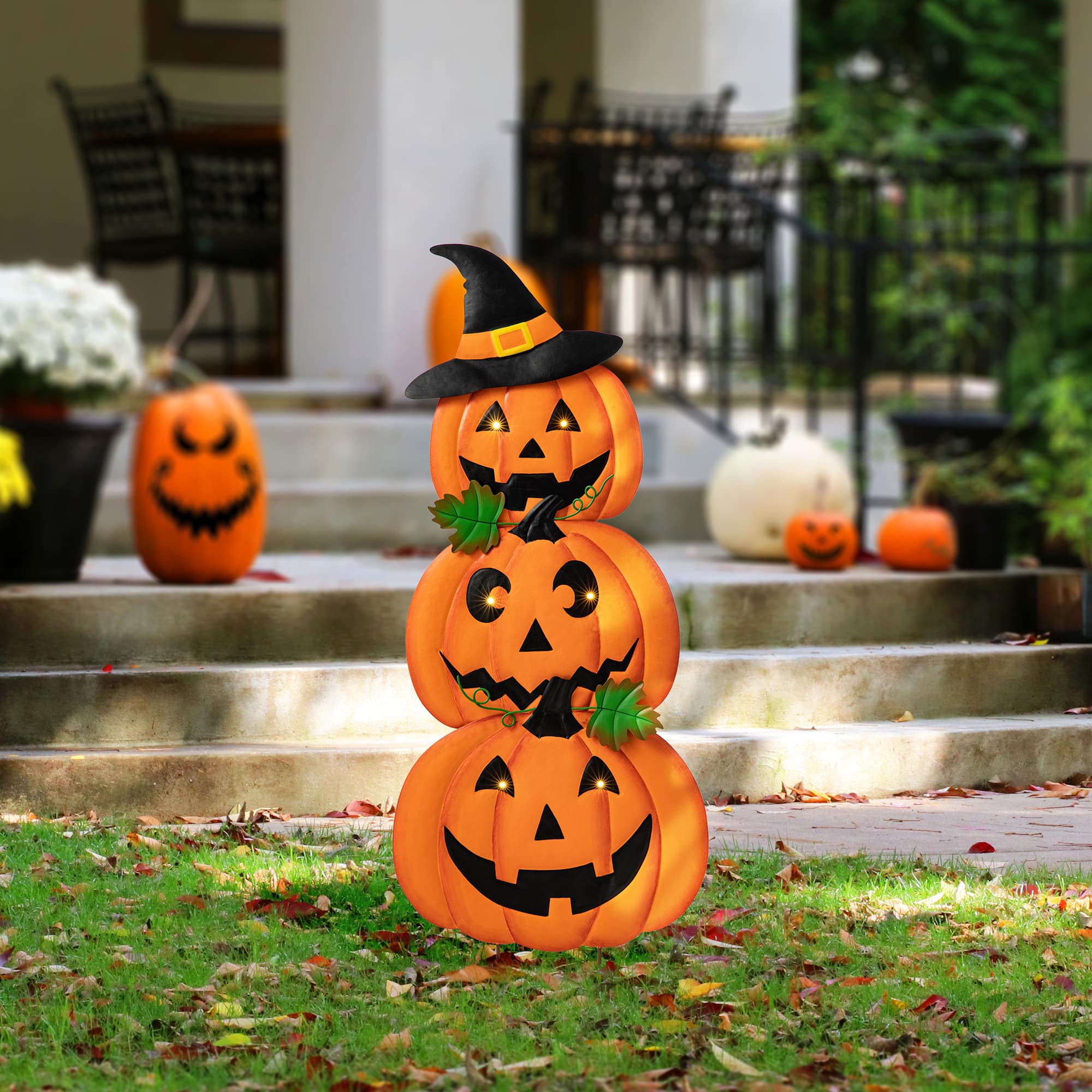 Glitzhome&#xAE; 3.3ft. Halloween Lighted Metal Stacked Jack-O-Lantern Yard Stake Set