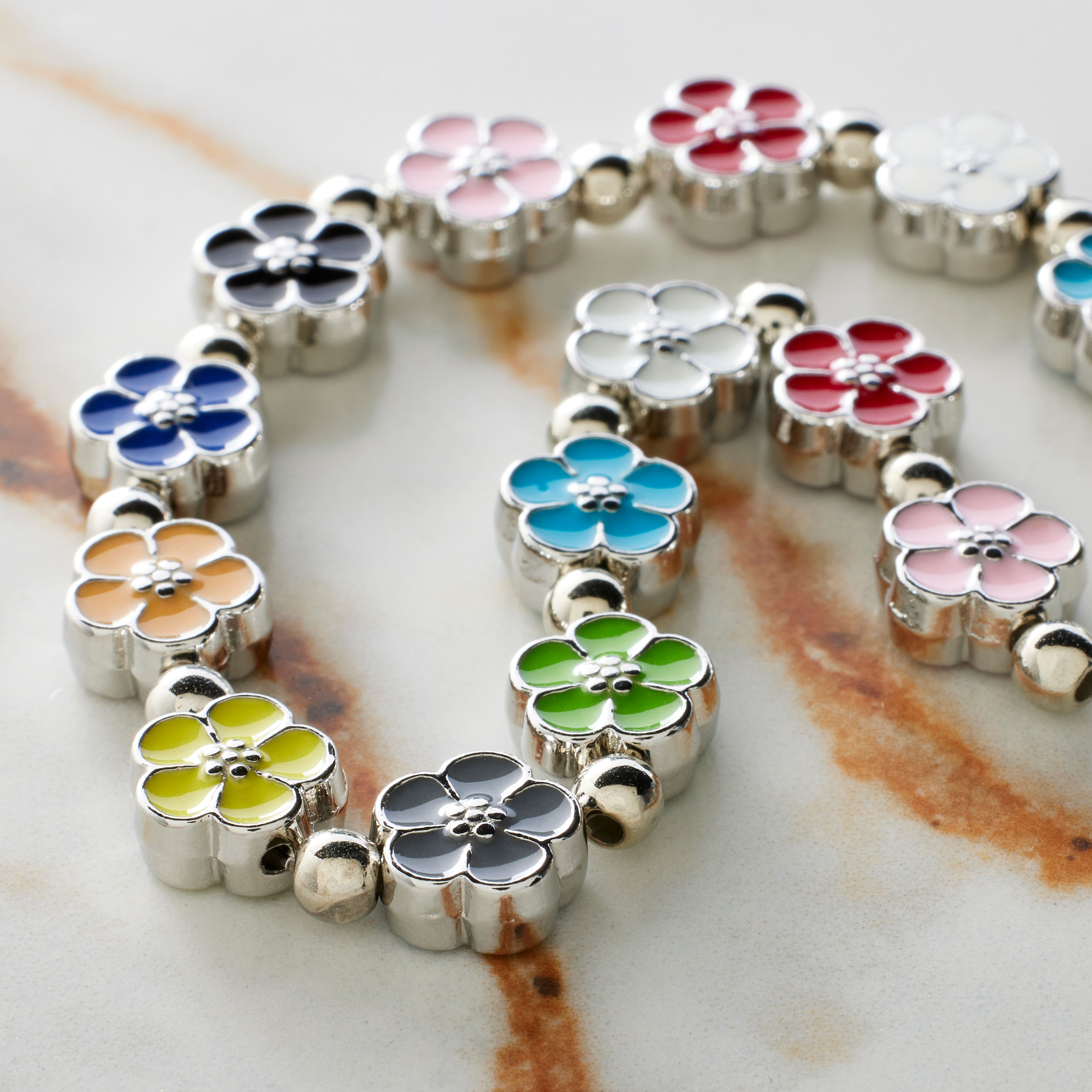 12 Packs: 16 ct. (192 total) Multicolor Enamel Metal Flower Beads, 8mm by Bead Landing™