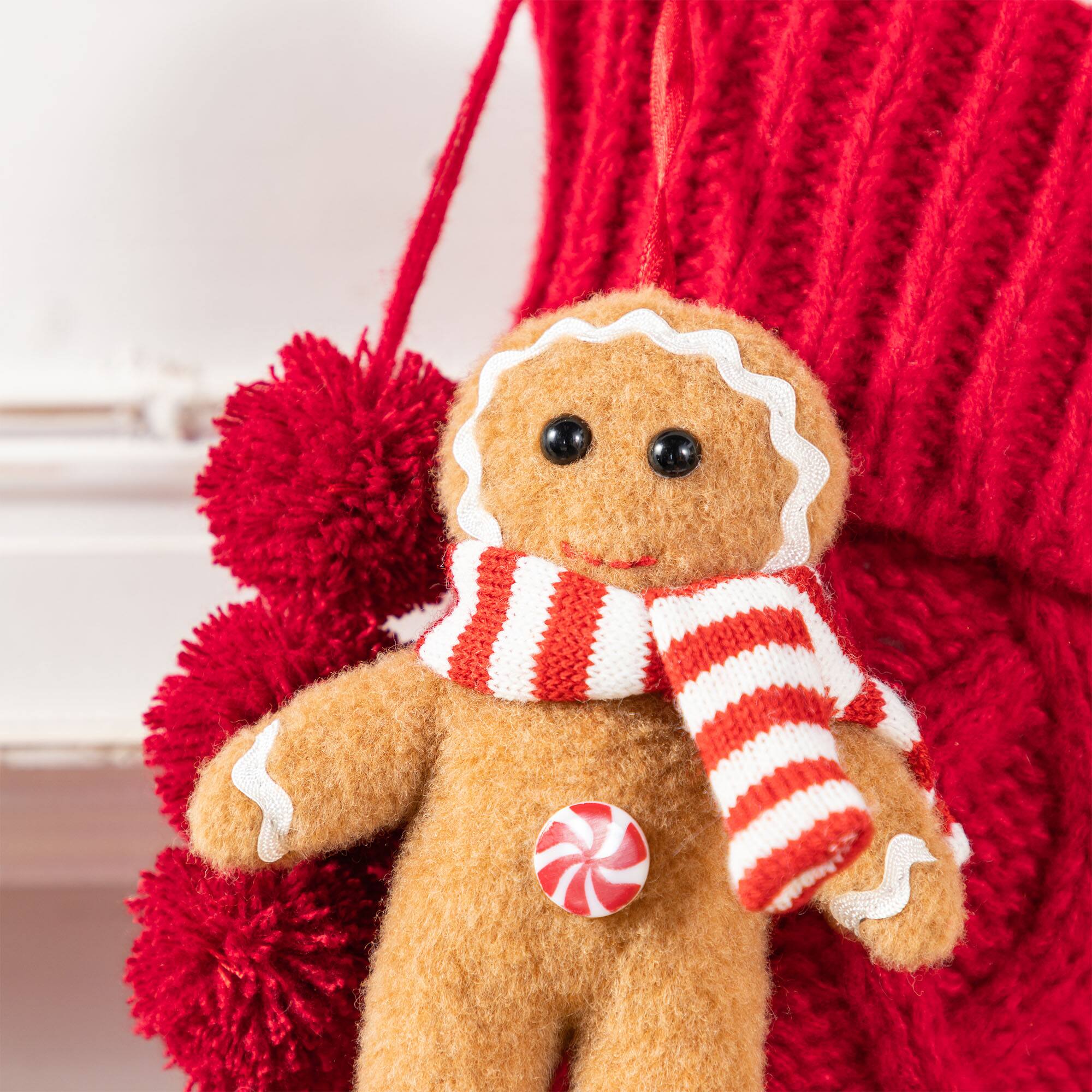 Glitzhome® 22"L Red Knitted Christmas Stocking with Gingerbread Man Ornament