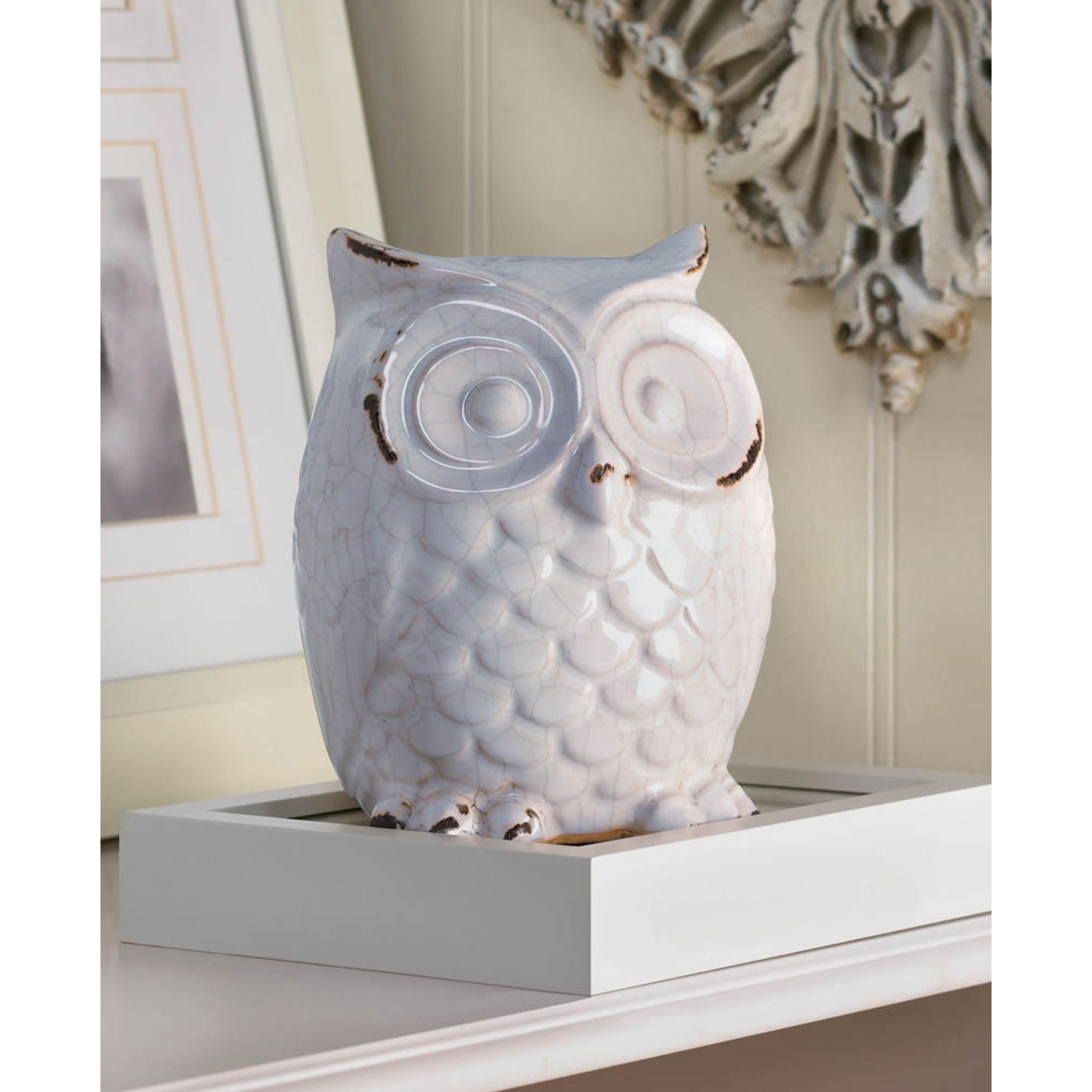 blue and white owl figurine