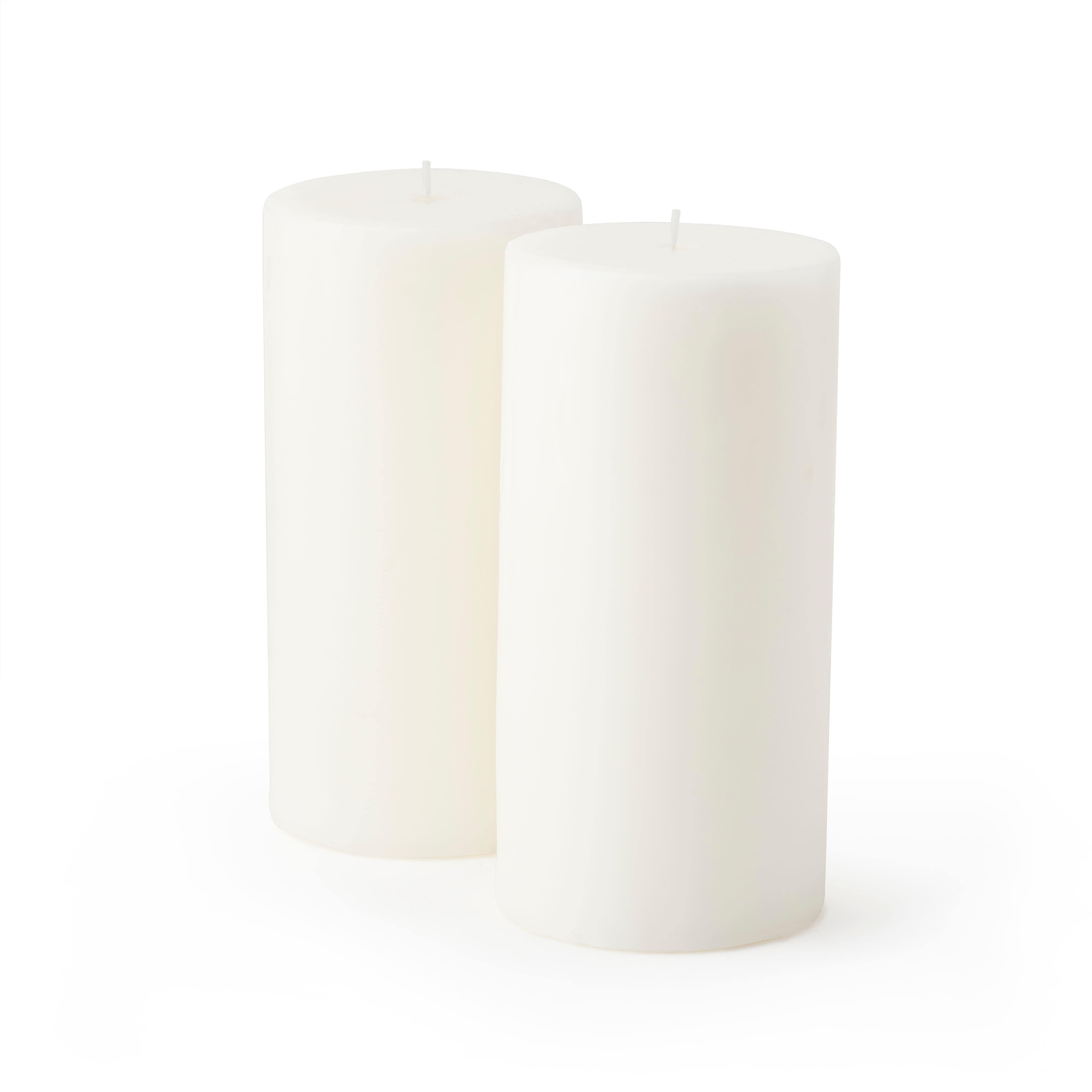 12 Packs: 2 ct. (24 total) White Pillar Candle Pair by Ashland&#xAE;