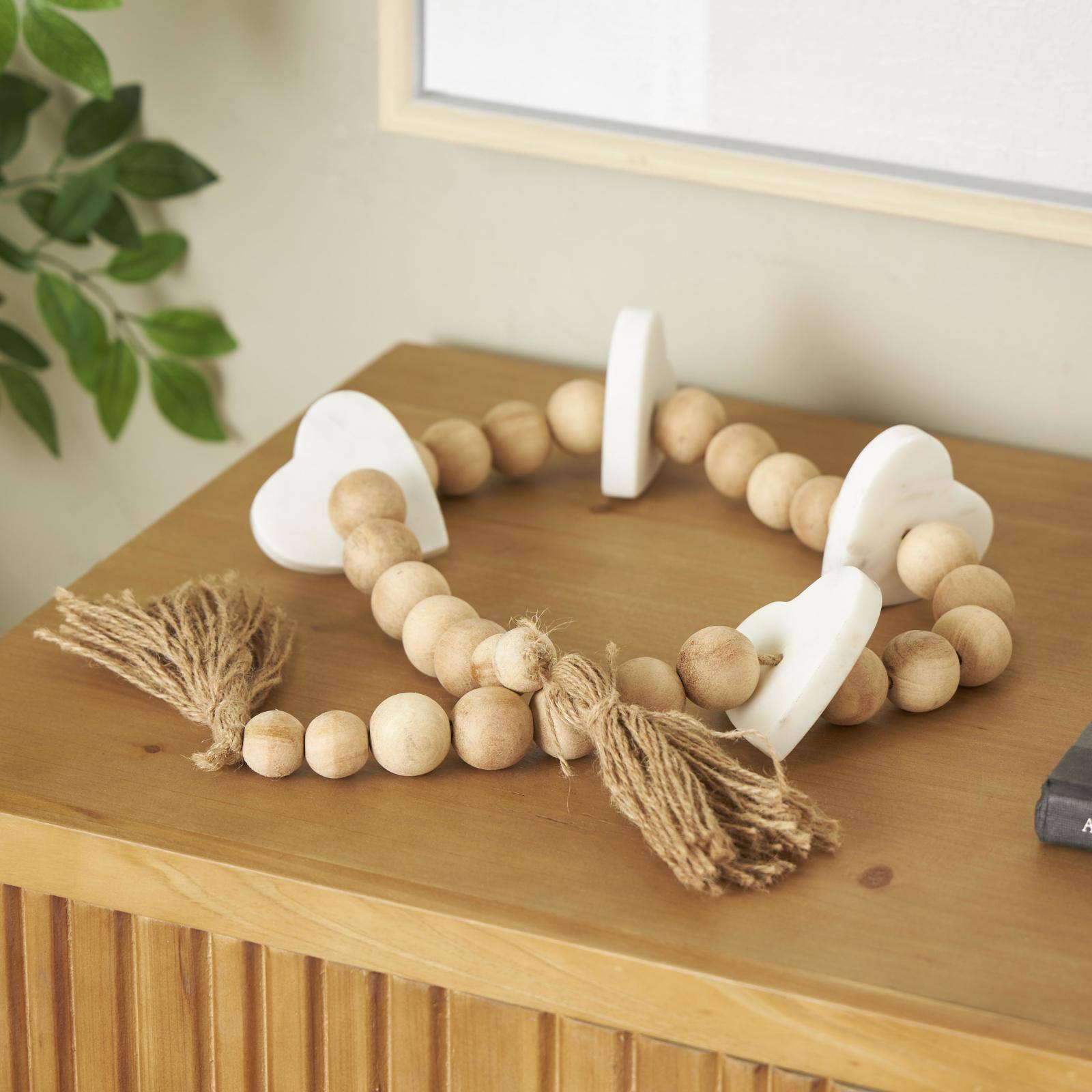 3.75ft. Light Brown Wood Bead & Marble Heart Garland with Tassel