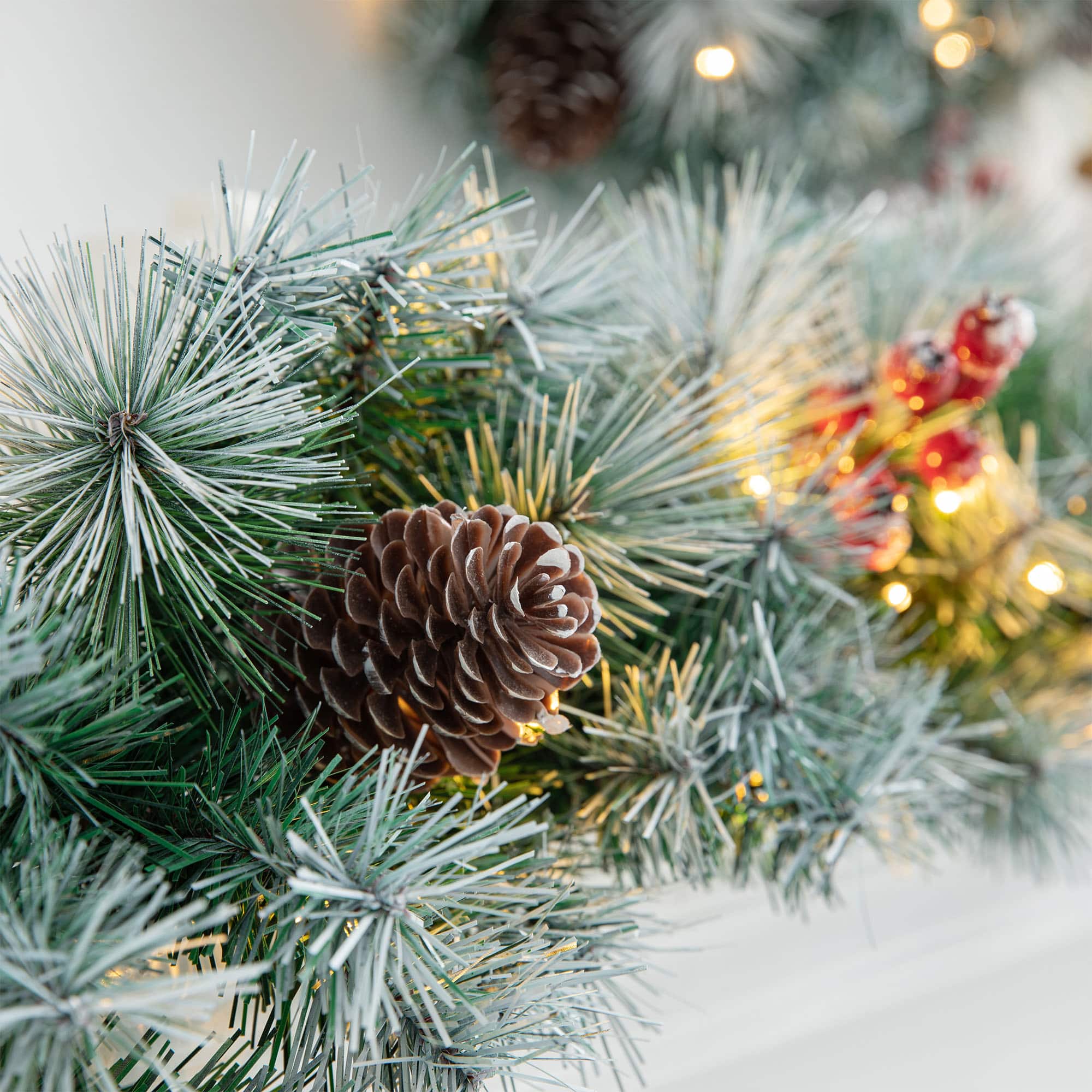 Glitzhome&#xAE; 2 Pack 9ft. Pre-Lit Greenery Pinecones &#x26; Red Berries Christmas Garland