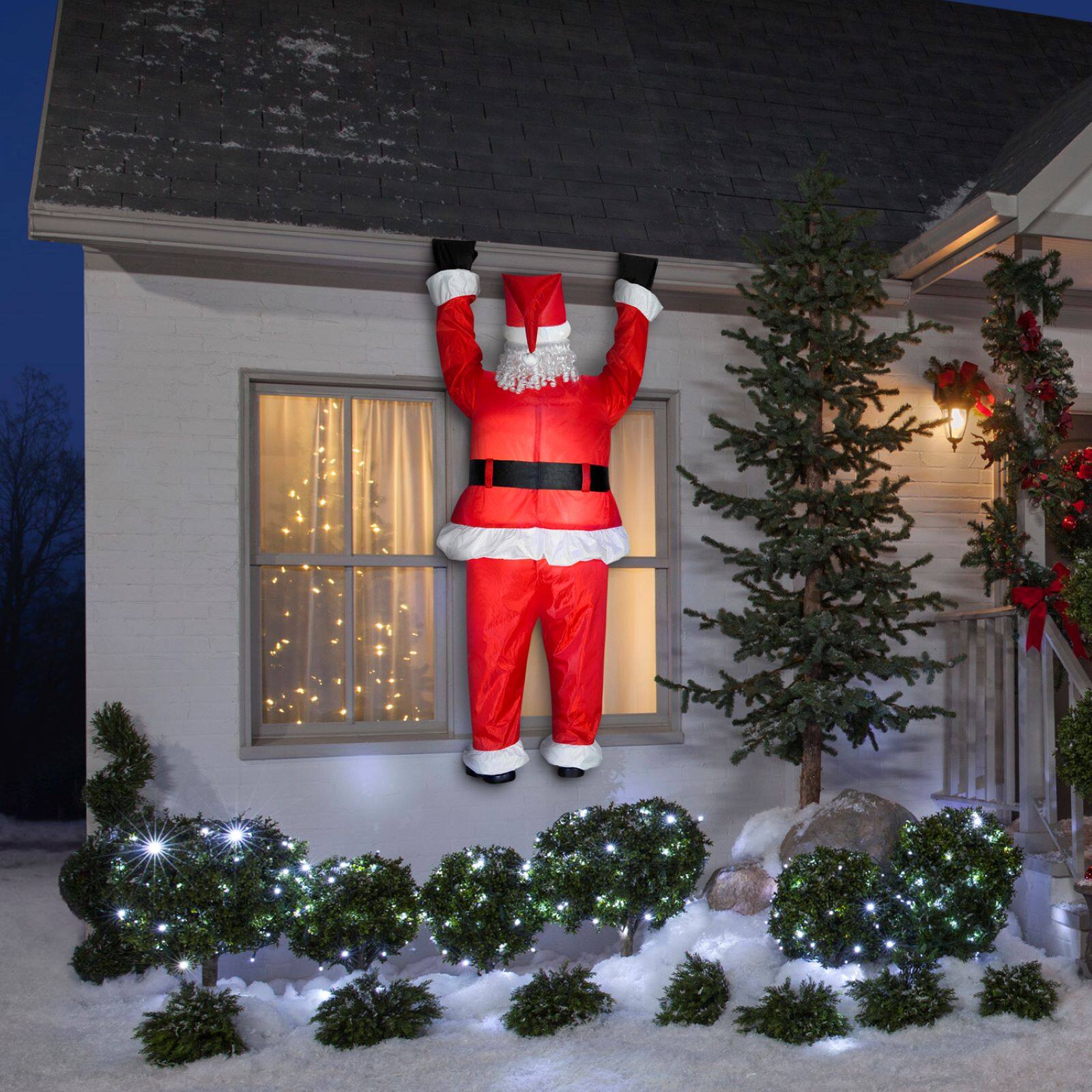 6.5ft. Airblown® Inflatable Realistic Roof-Hangin' Santa