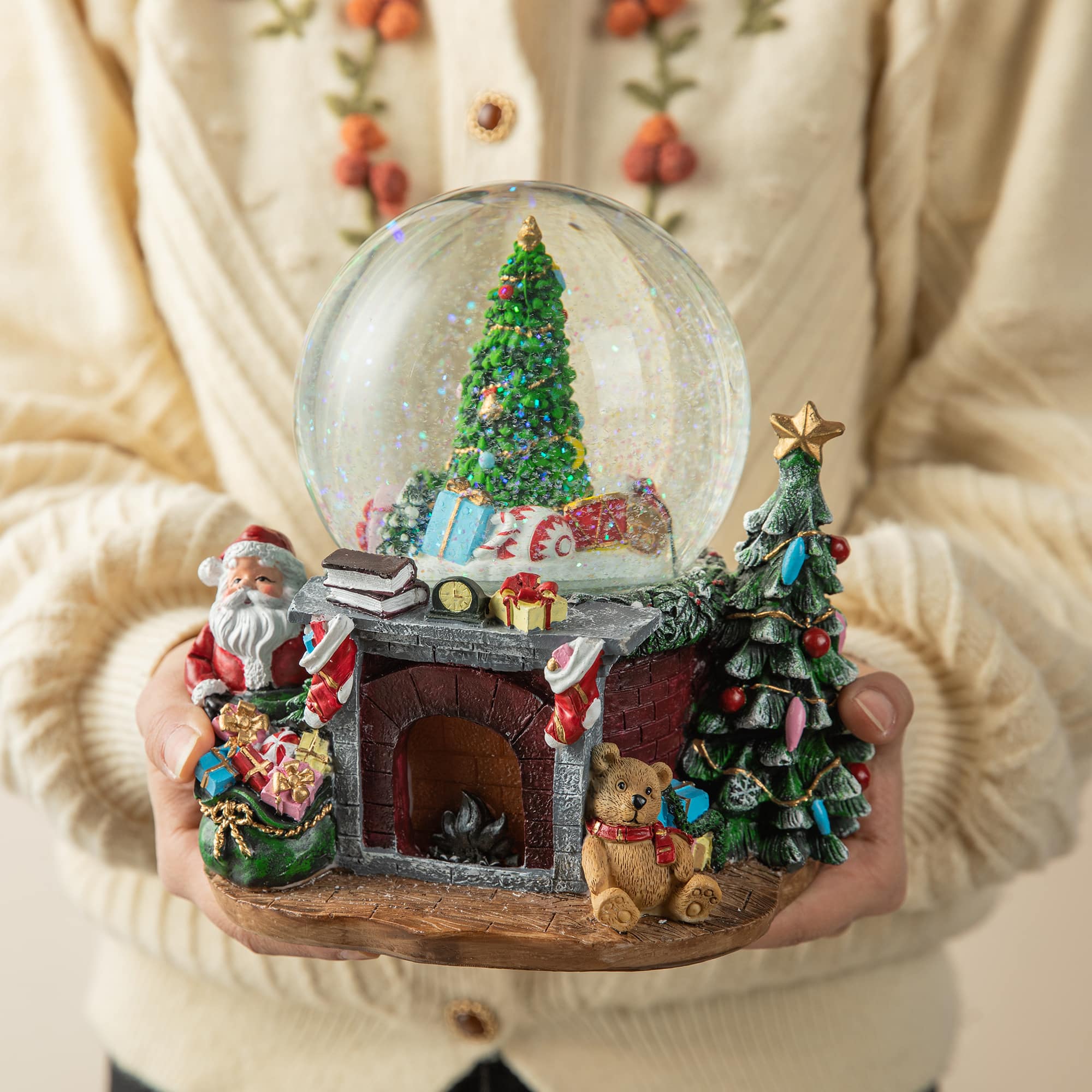 Glitzhome® 7.75" Lighted Musical Christmas Tree on Fireplace Waterglobe