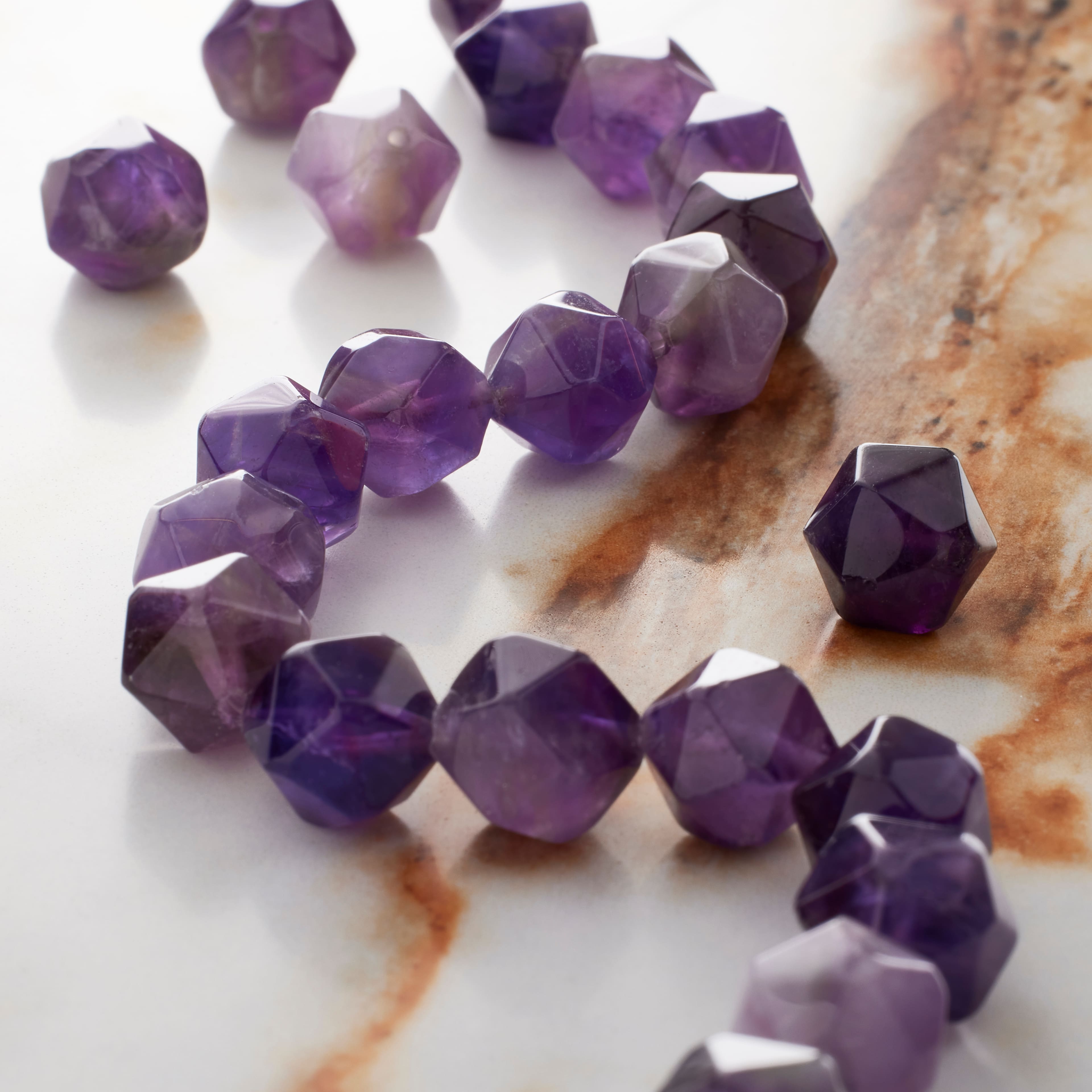 12 Pack: Amethyst Faceted Star Cut Beads, 10mm by Bead Landing™