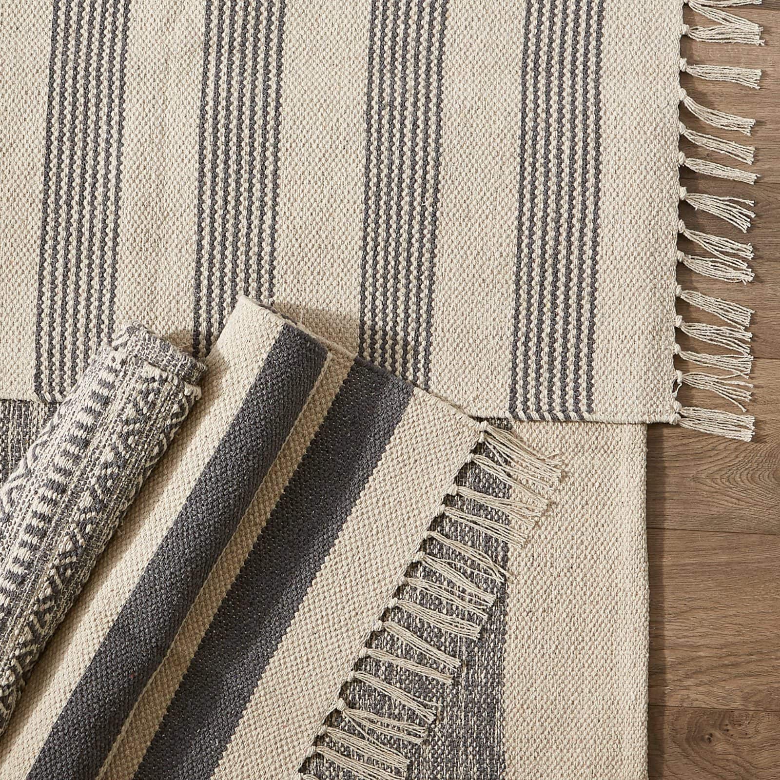 DII® Gray Variegated Border Hand-Loomed Rug, 2ft. x 3ft.