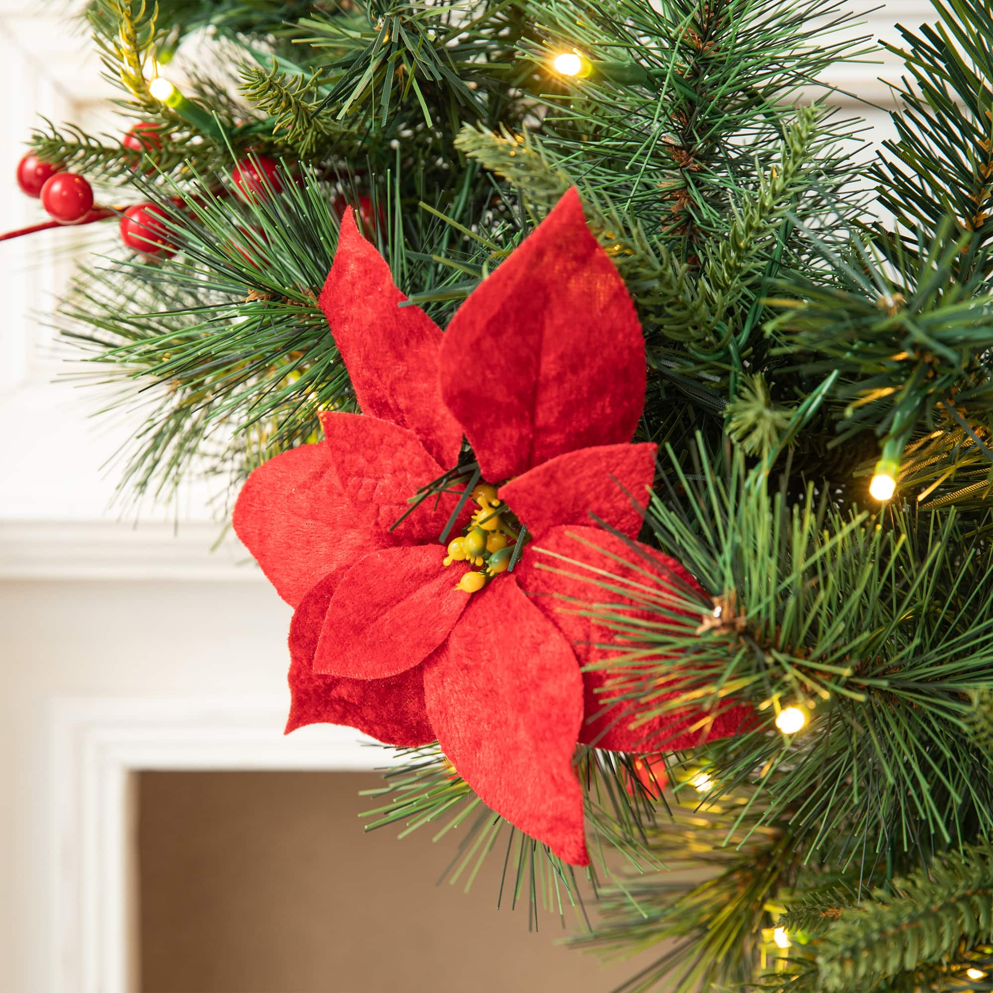 Glitzhome&#xAE; 3ft. Pre-Lit Pine, Poinsettia &#x26; Berries Christmas Swag