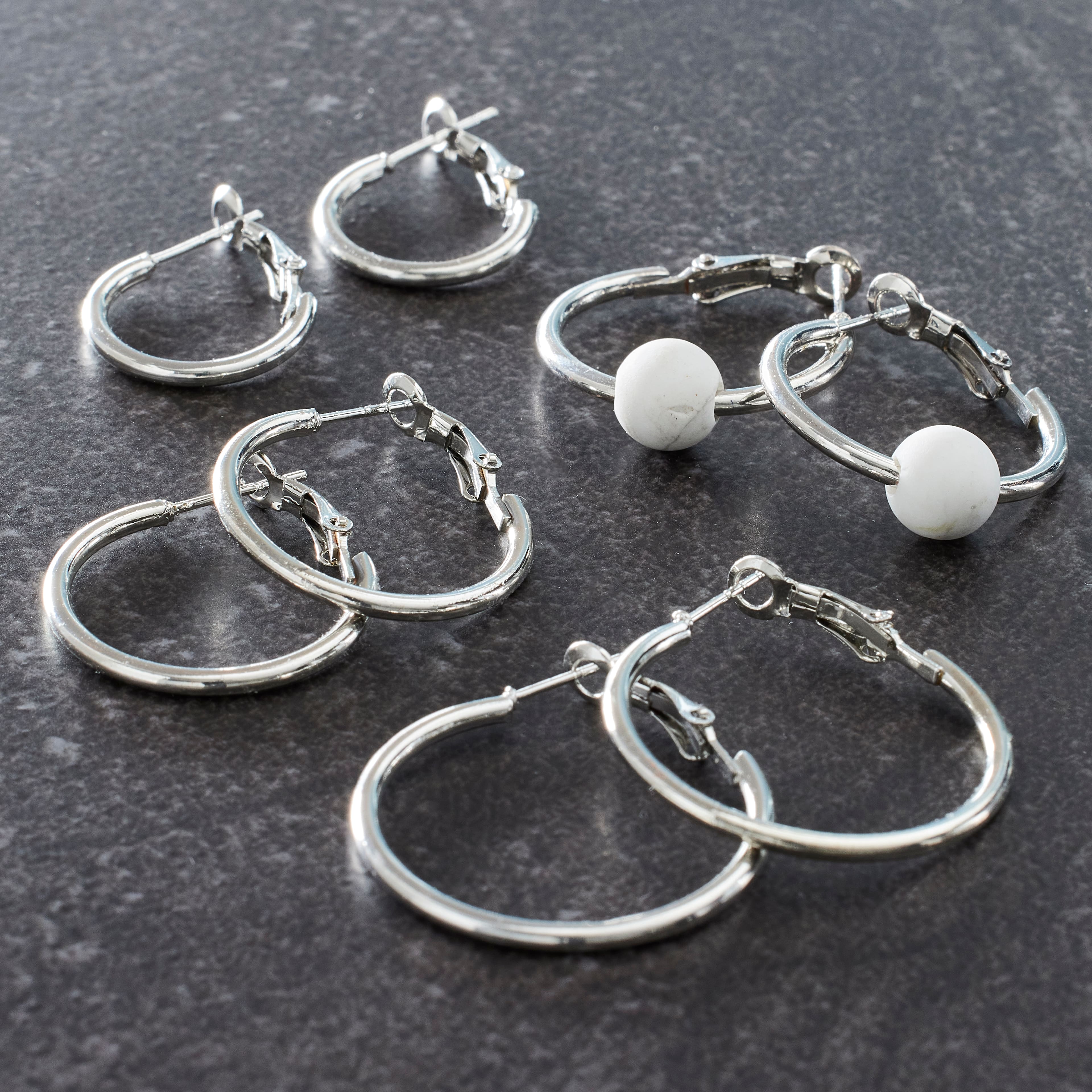 12 Packs: 4 ct. (48 total) Silver Hoop Earrings by Bead Landing&#xAE;