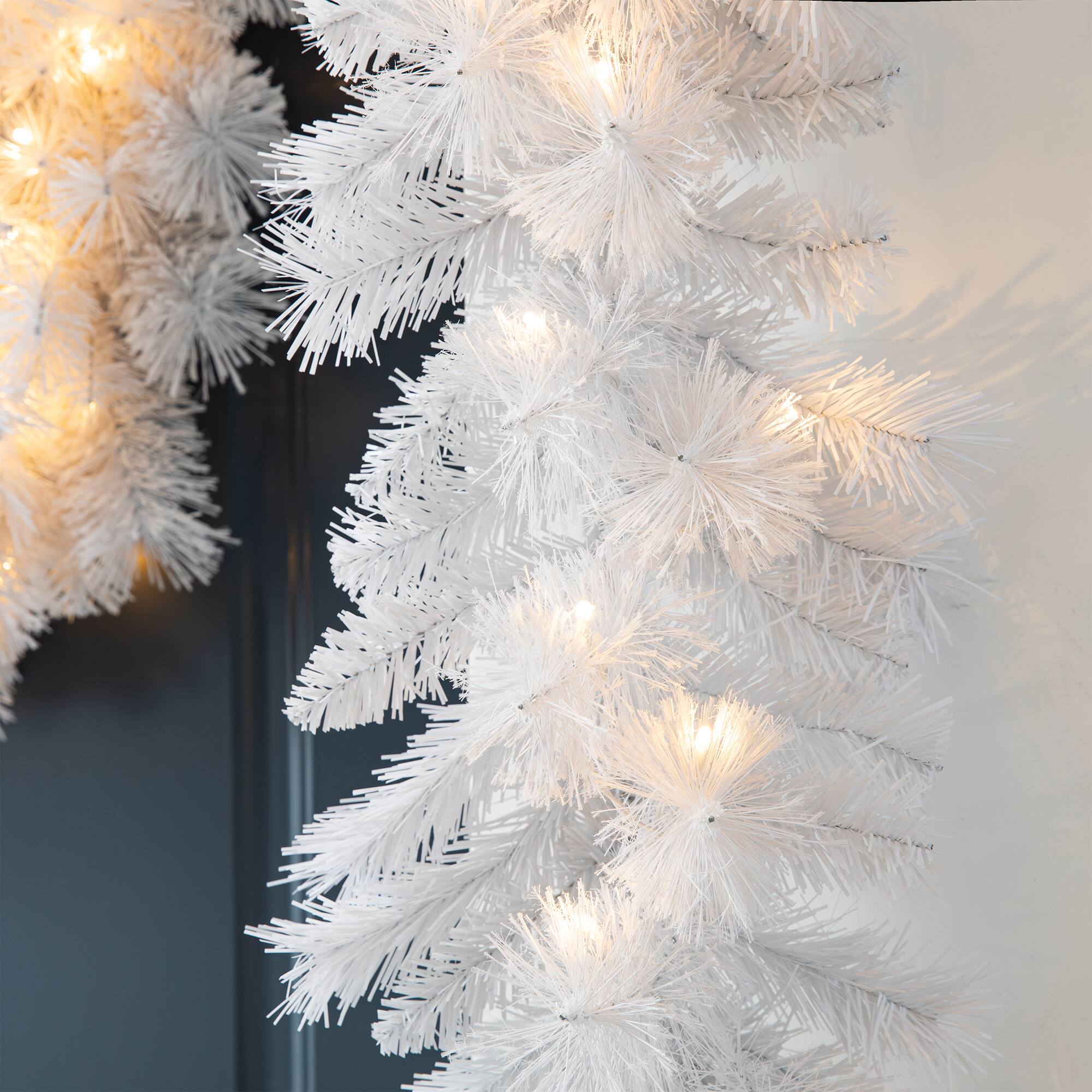 Glitzhome&#xAE; 9ft. Pre-Lit White Pine Christmas Garland with LED Lights and Timer